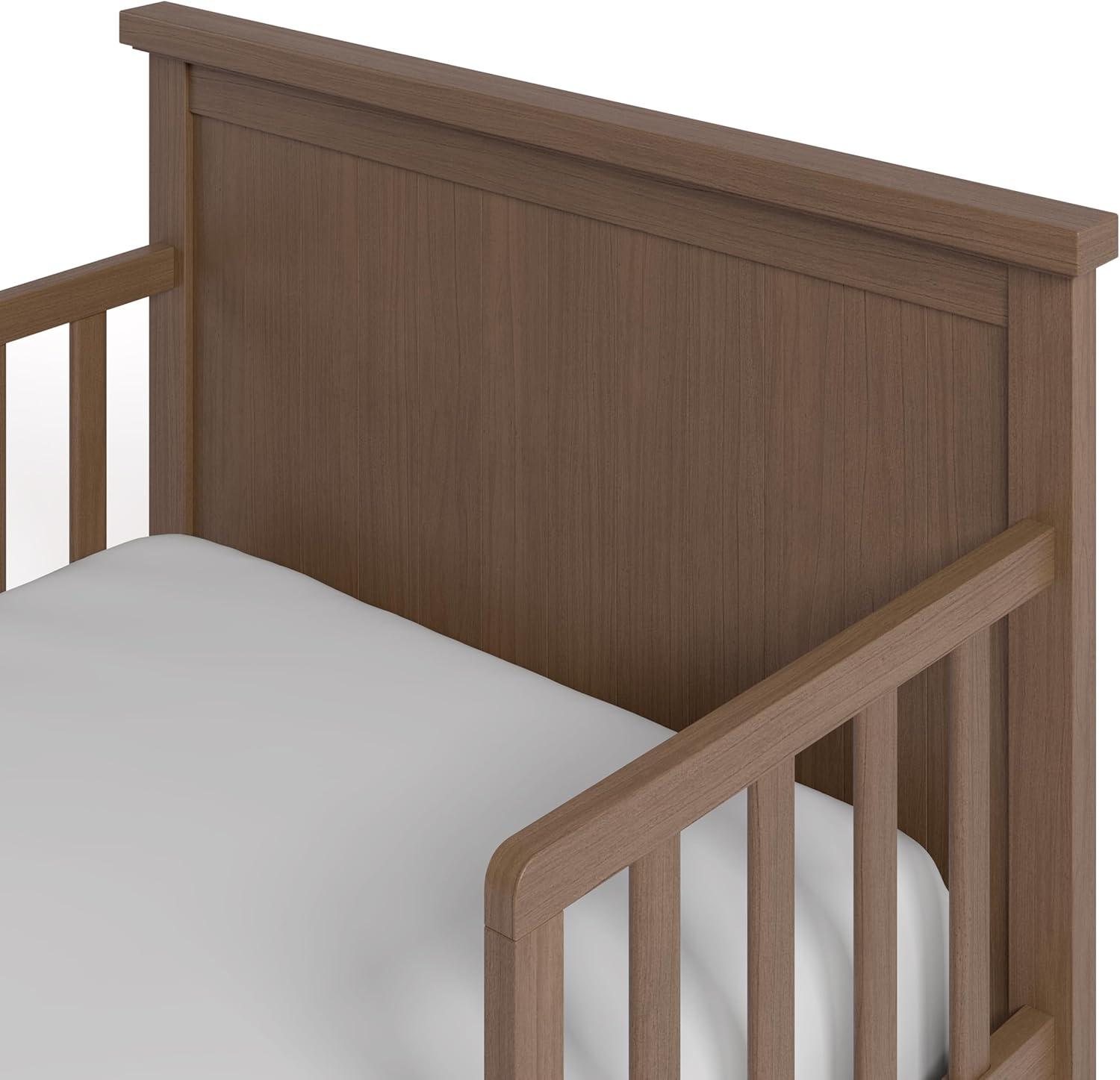 imageGraco Bailey Toddler Bed White GREENGUARD Gold Certified Fits Standard FullSize Crib ampamp Toddler Mattress Toddler Safety Guardrails Included Complete Design with Solid Headboard FootboardHazelnut