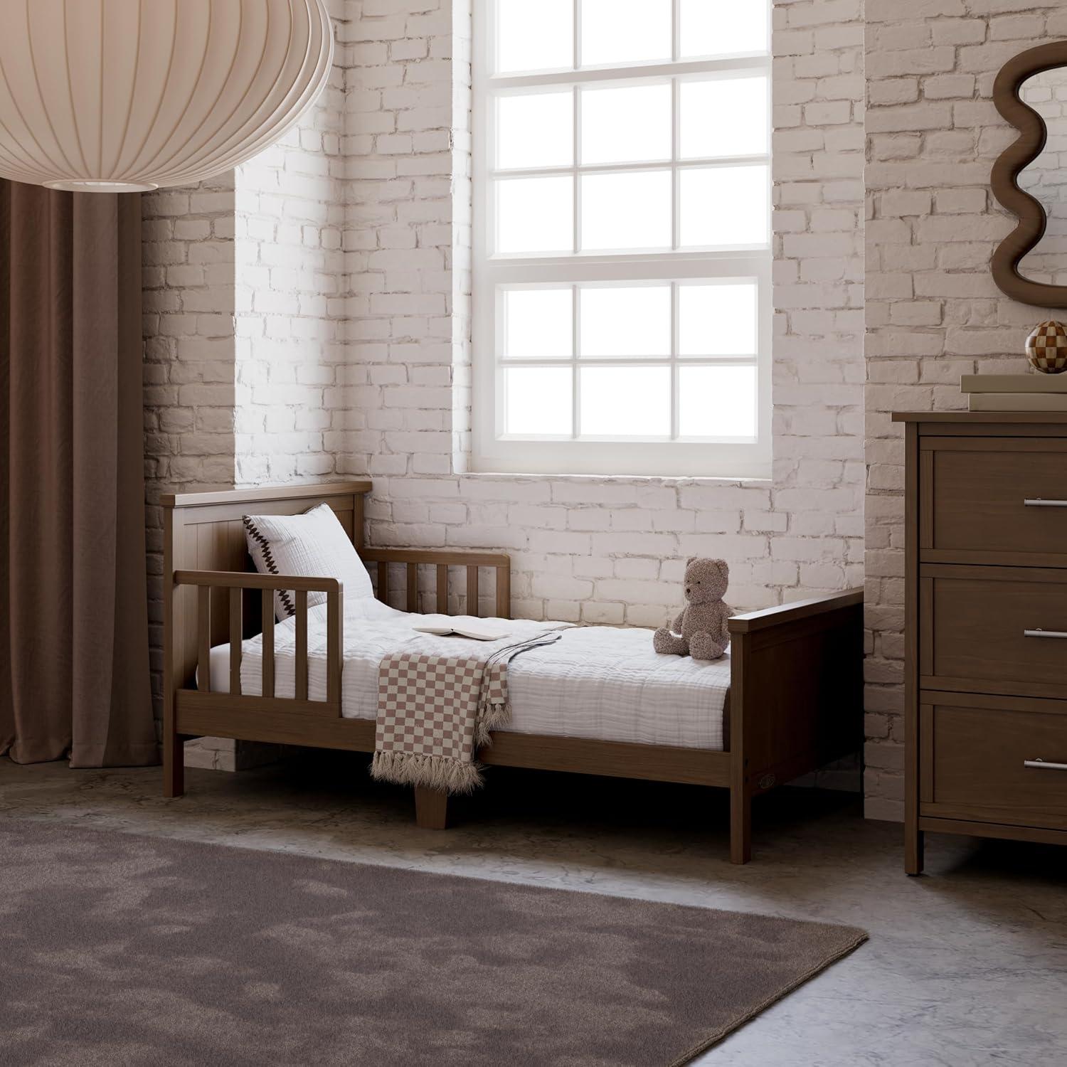 imageGraco Bailey Toddler Bed White GREENGUARD Gold Certified Fits Standard FullSize Crib ampamp Toddler Mattress Toddler Safety Guardrails Included Complete Design with Solid Headboard FootboardHazelnut