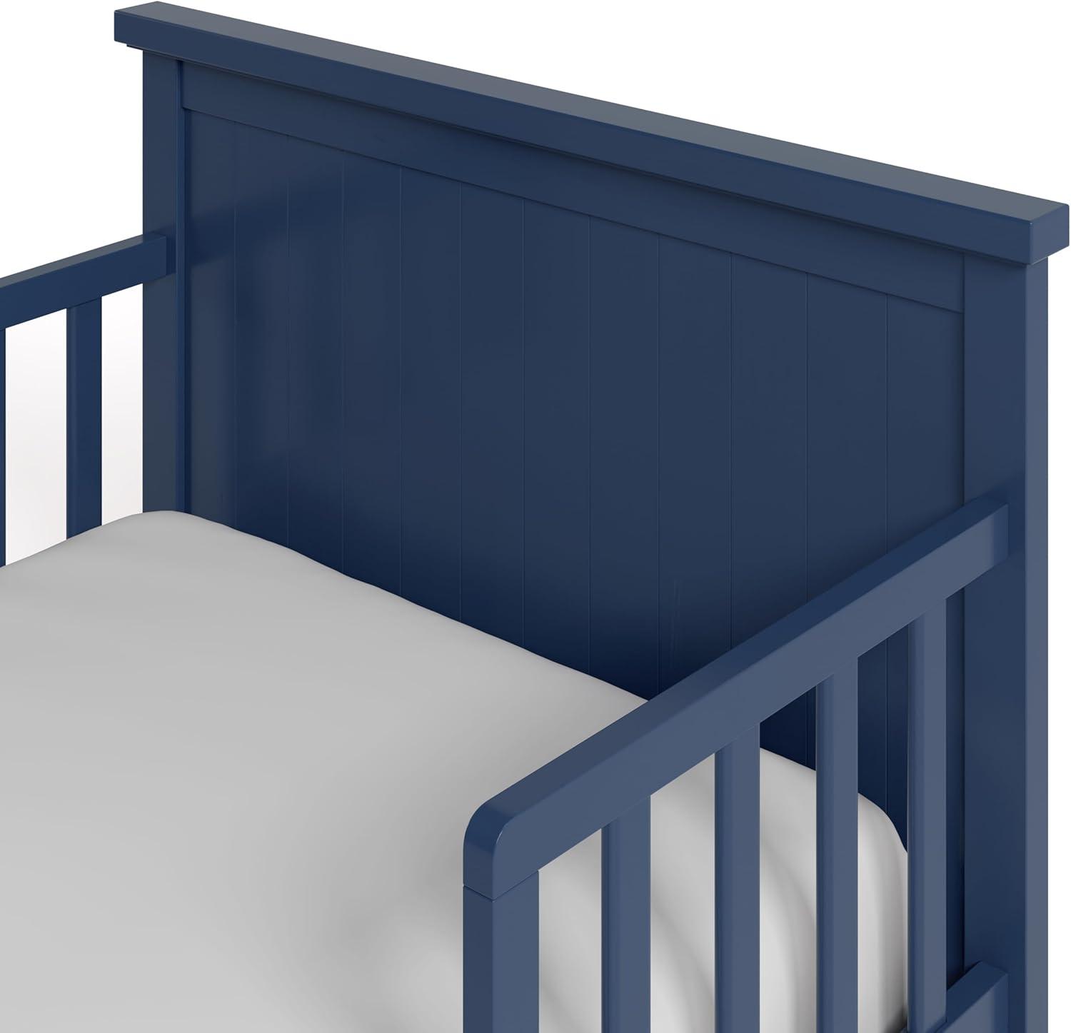 imageGraco Bailey Toddler Bed White GREENGUARD Gold Certified Fits Standard FullSize Crib ampamp Toddler Mattress Toddler Safety Guardrails Included Complete Design with Solid Headboard FootboardMidnight Blue