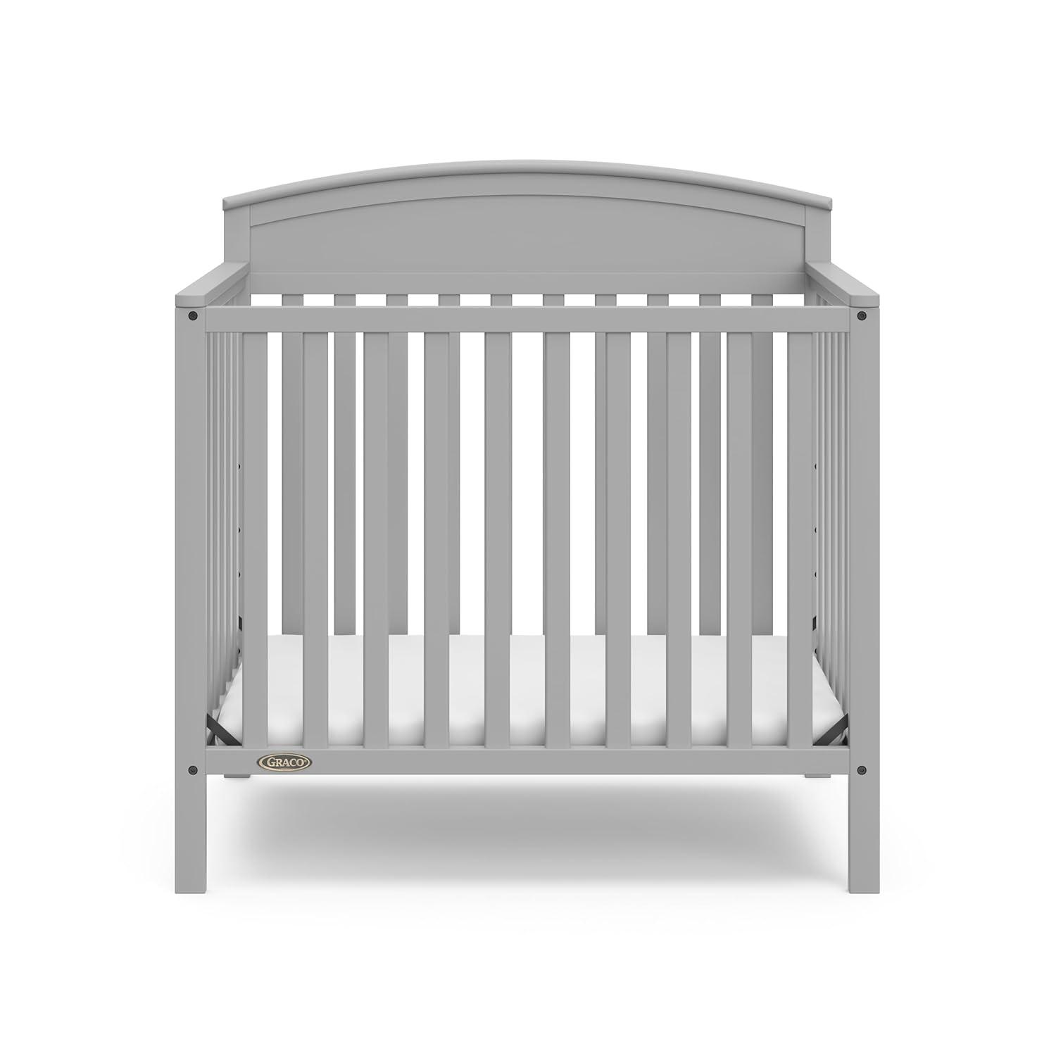 imageGraco Benton 4in1 Convertible Mini Crib with Bonus Crib Mattress White GREENGUARD Gold Certified 275Inch Mattress Included Baby Crib Converts to Twin Bed Ideal for Small SpacesPebble Gray