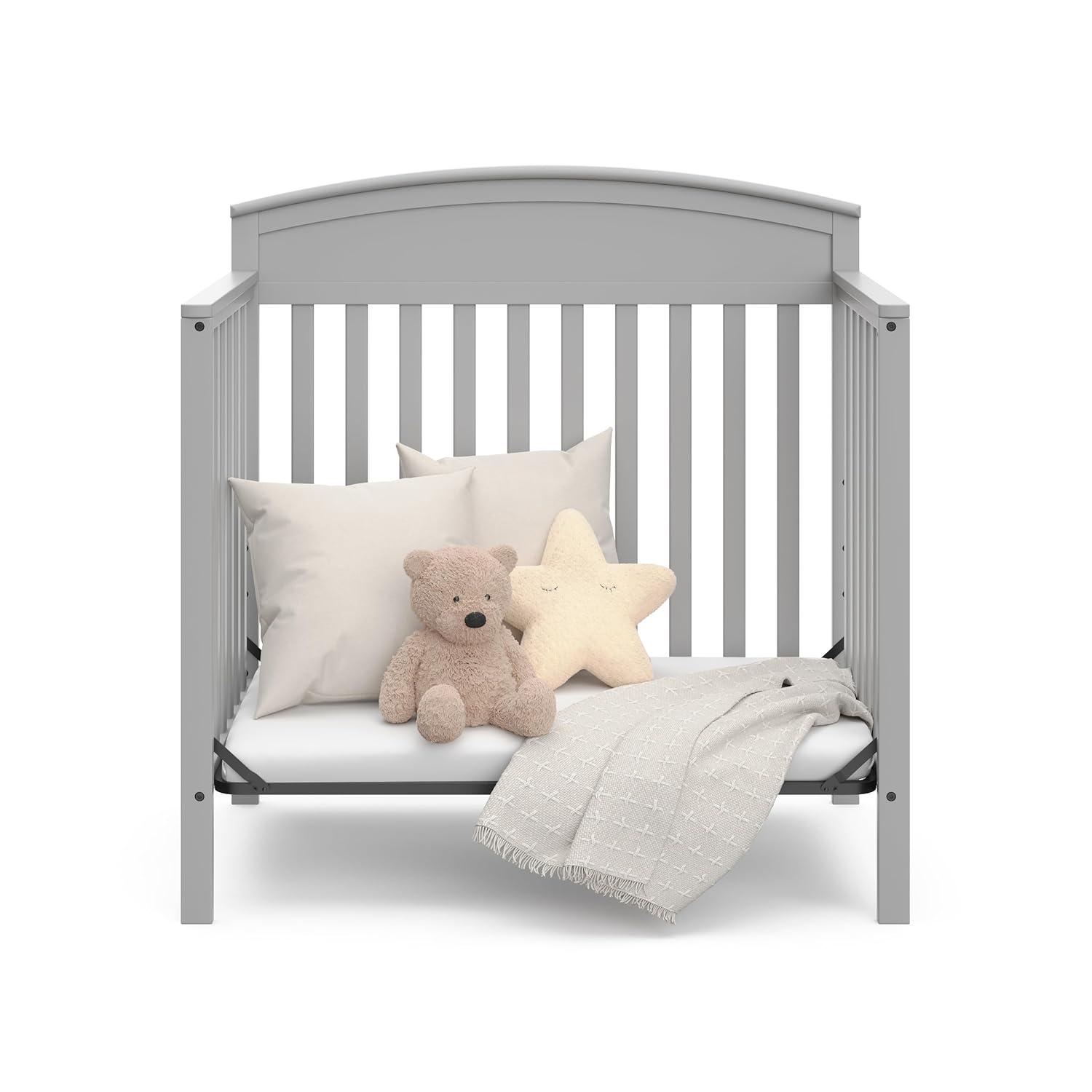imageGraco Benton 4in1 Convertible Mini Crib with Bonus Crib Mattress White GREENGUARD Gold Certified 275Inch Mattress Included Baby Crib Converts to Twin Bed Ideal for Small SpacesPebble Gray