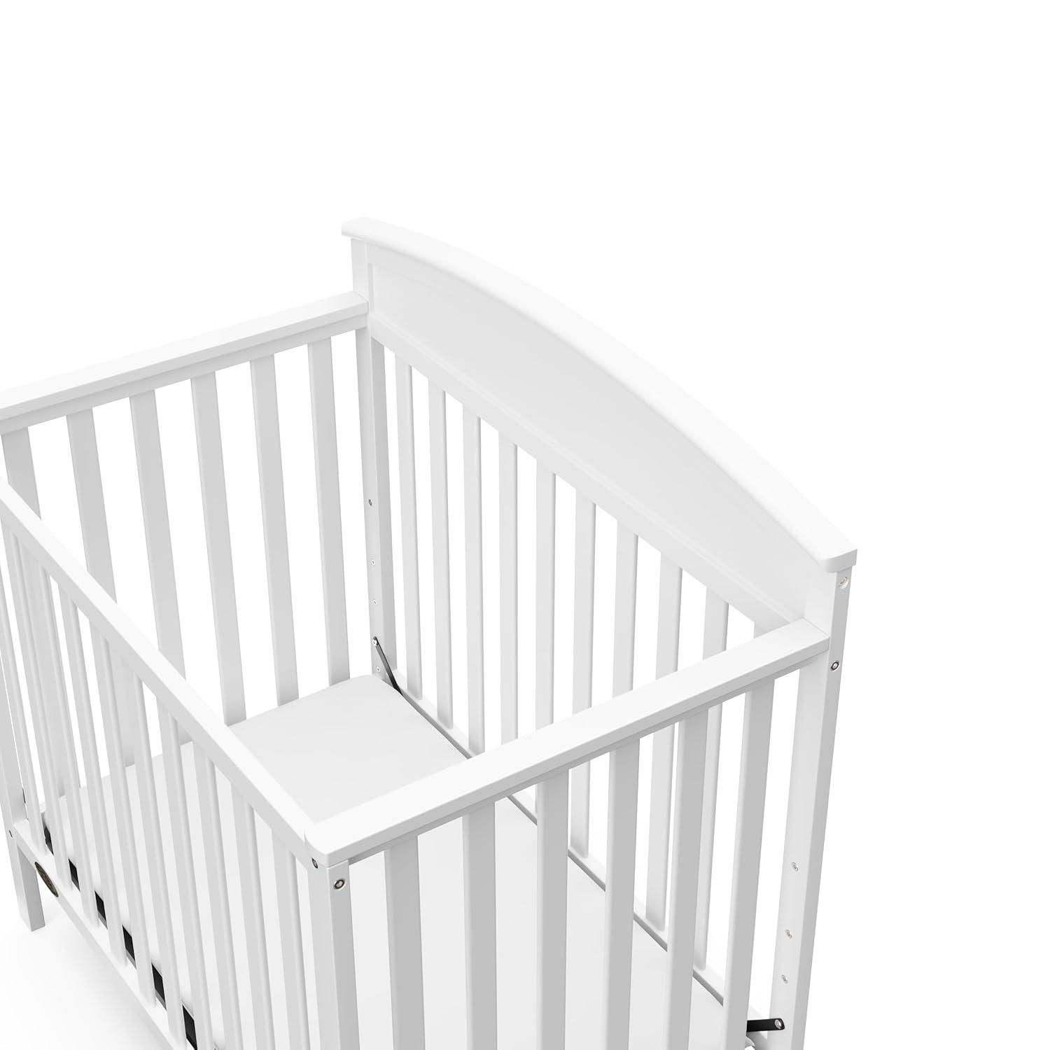 imageGraco Benton 4in1 Convertible Mini Crib with Bonus Crib Mattress White GREENGUARD Gold Certified 275Inch Mattress Included Baby Crib Converts to Twin Bed Ideal for Small SpacesWhite