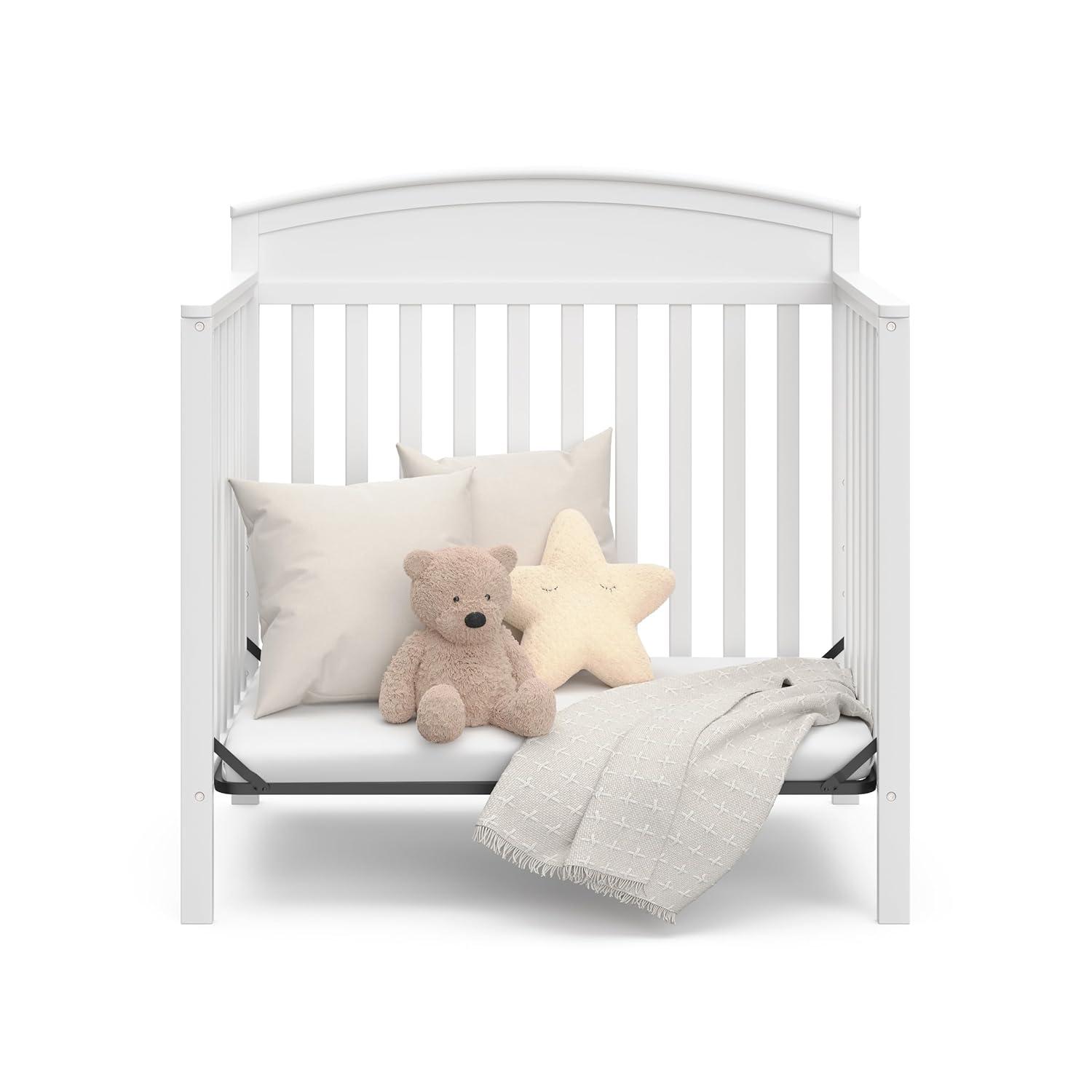 imageGraco Benton 4in1 Convertible Mini Crib with Bonus Crib Mattress White GREENGUARD Gold Certified 275Inch Mattress Included Baby Crib Converts to Twin Bed Ideal for Small SpacesWhite