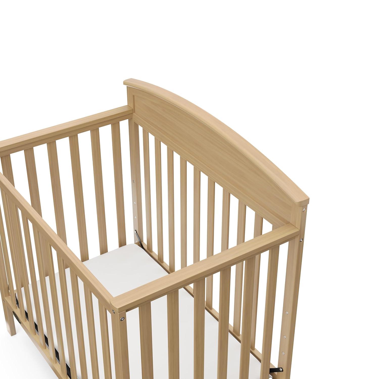 imageGraco Benton 4in1 Convertible Mini Crib with Bonus Crib Mattress White GREENGUARD Gold Certified 275Inch Mattress Included Baby Crib Converts to Twin Bed Ideal for Small SpacesDriftwood