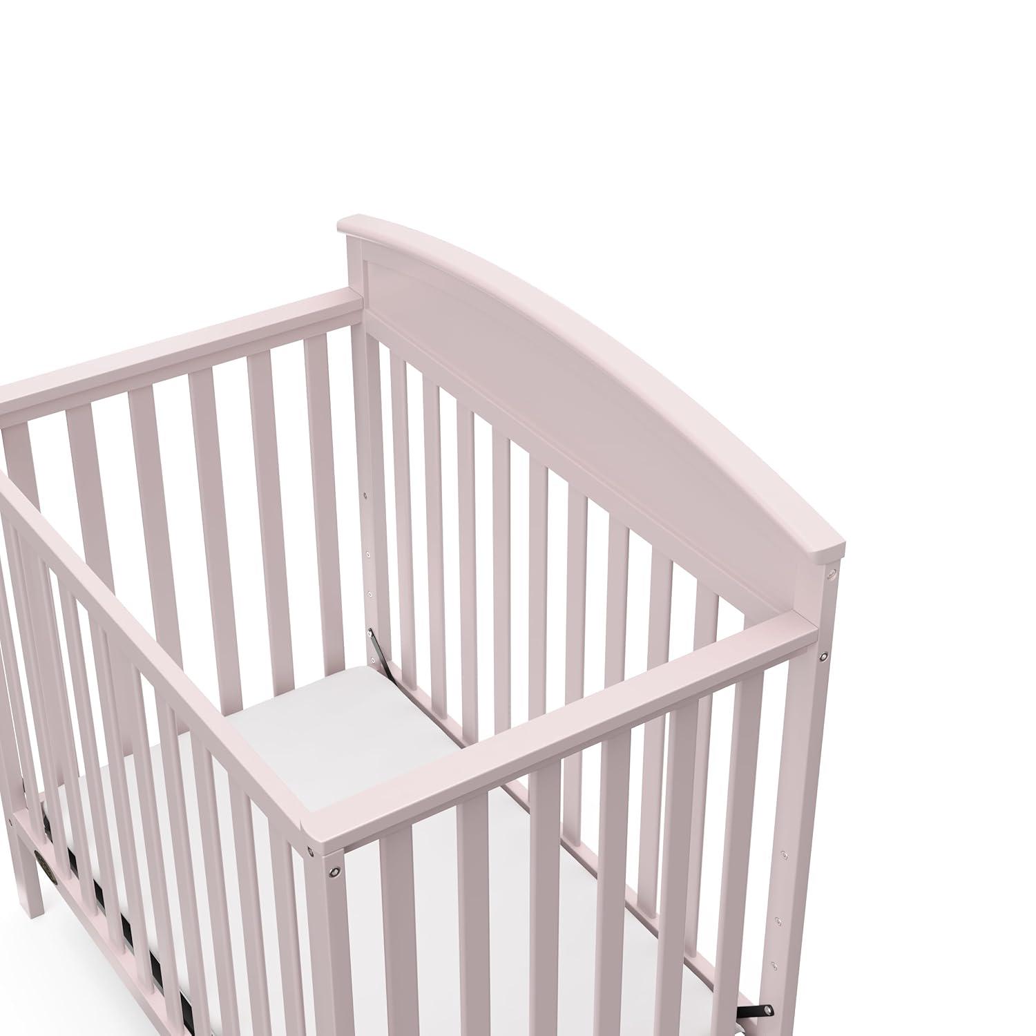 imageGraco Benton 4in1 Convertible Mini Crib with Bonus Crib Mattress White GREENGUARD Gold Certified 275Inch Mattress Included Baby Crib Converts to Twin Bed Ideal for Small SpacesBlush