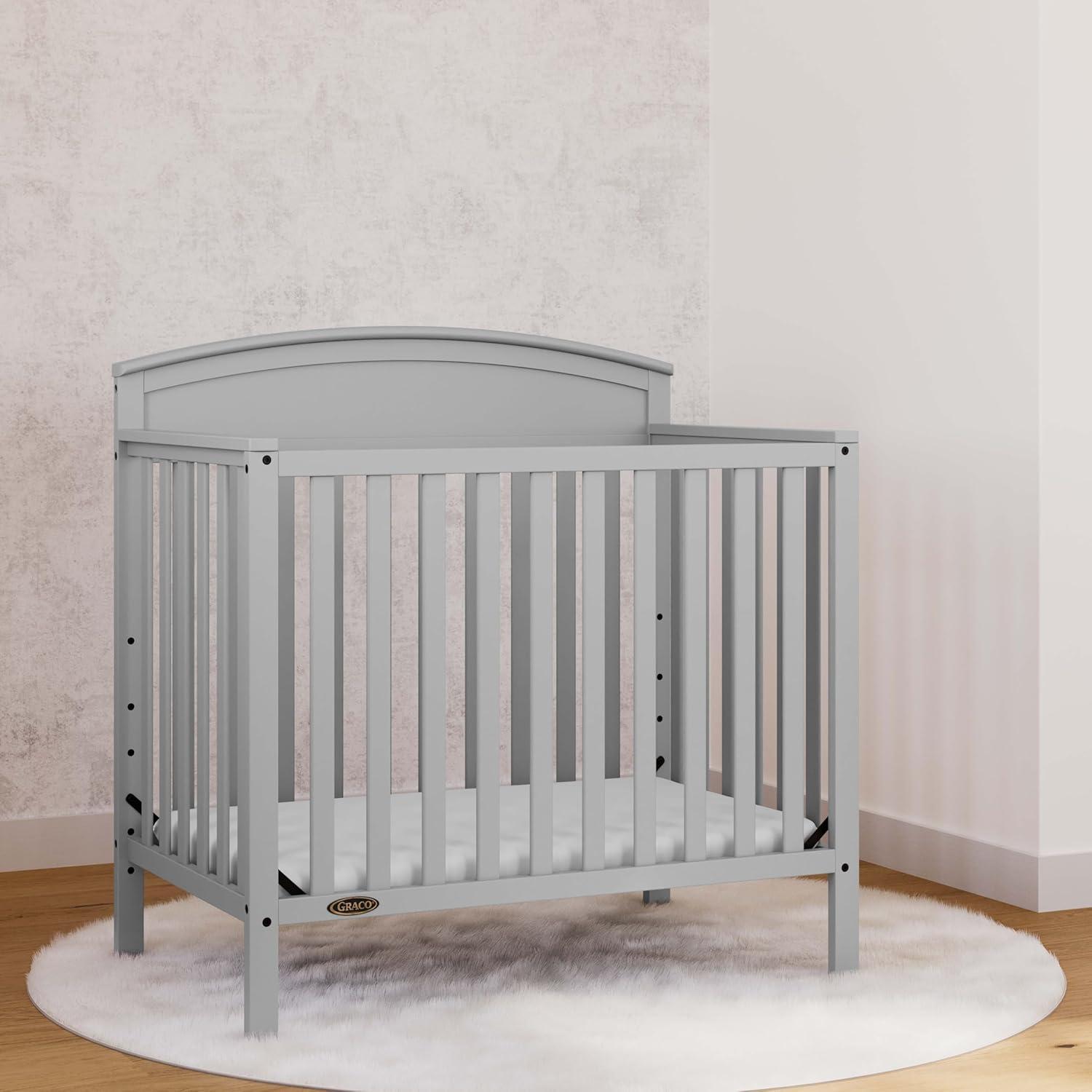 imageGraco Benton 4in1 Convertible Mini Crib with Bonus Crib Mattress White GREENGUARD Gold Certified 275Inch Mattress Included Baby Crib Converts to Twin Bed Ideal for Small SpacesPebble Gray