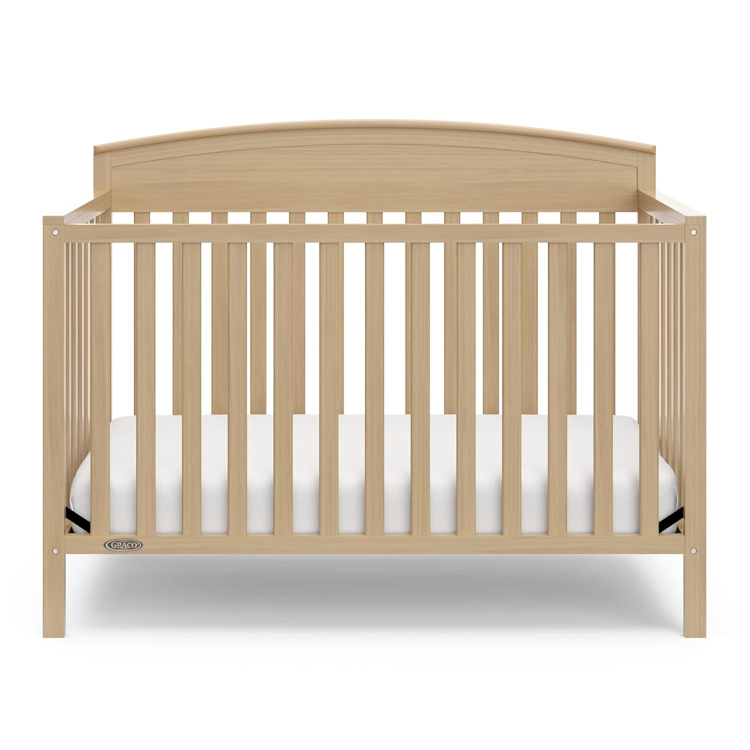 imageGraco Benton 5 in 1 Convertible Crib GREENGUARD Gold Certified with Premium Foam Crib and Toddler Mattress Included Pebble Gray Converts from Baby Crib to Toddler Bed Daybed and FullSize BedDriftwood