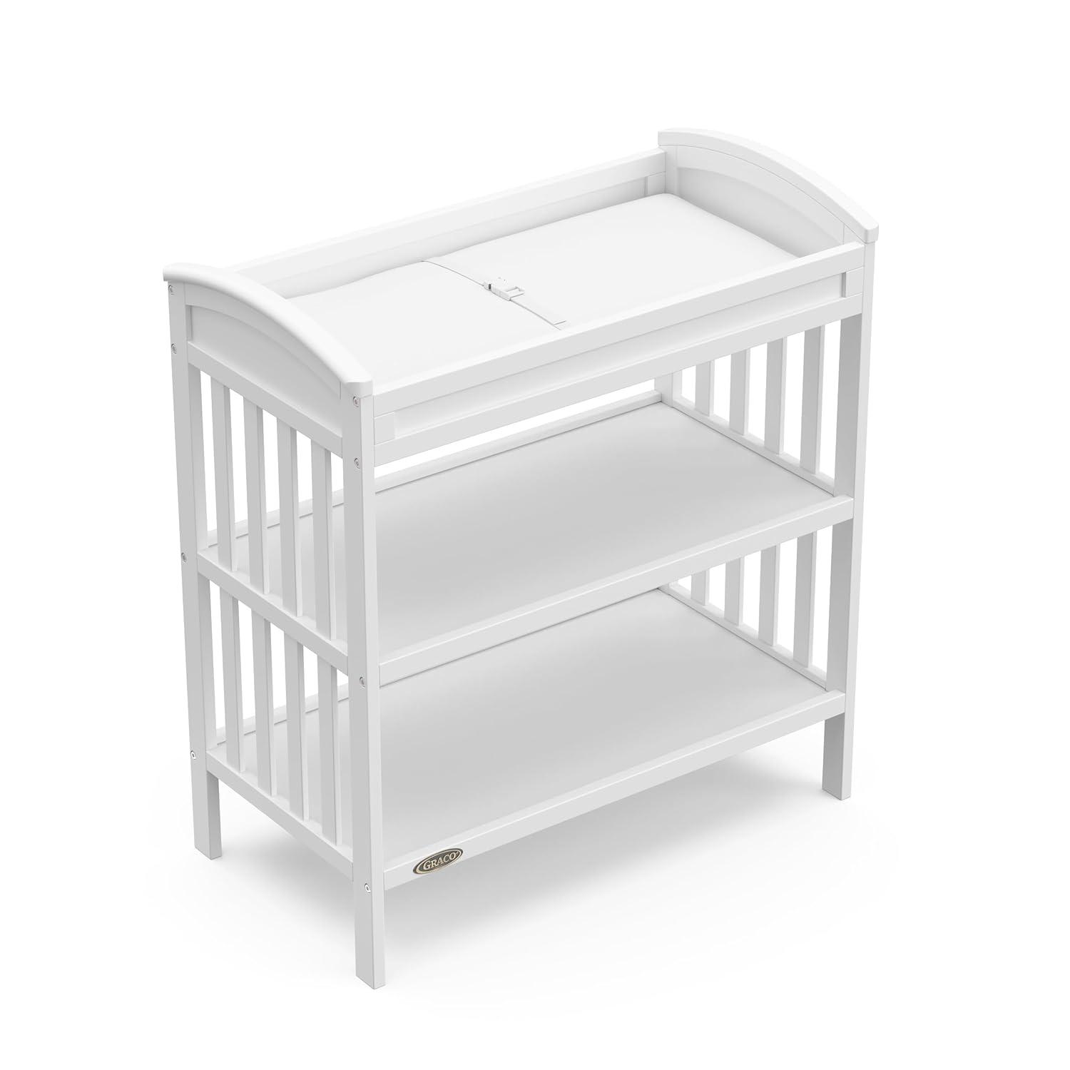 imageGraco Benton Changing Table with Bonus WaterResistant Changing Pad White GREENGUARD Gold Certified Includes Diaper Change Pad with Safety Strap 2 Open Storage Shelves for OrganizingWhite