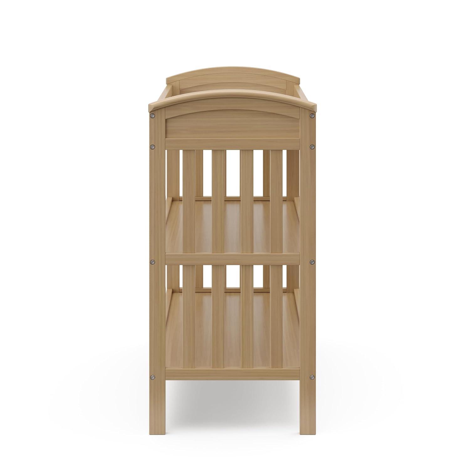 imageGraco Benton Changing Table with Bonus WaterResistant Changing Pad White GREENGUARD Gold Certified Includes Diaper Change Pad with Safety Strap 2 Open Storage Shelves for OrganizingDriftwood