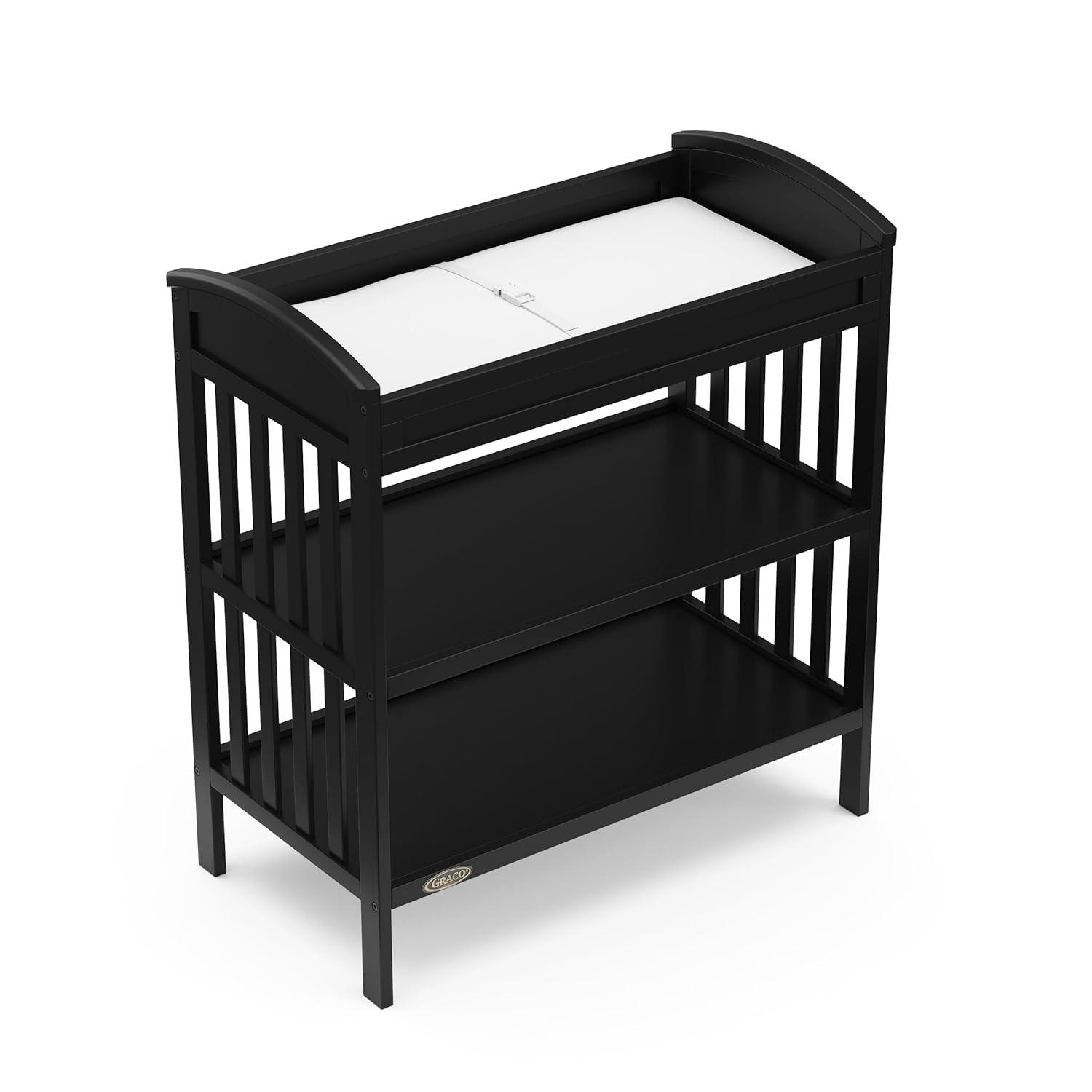 imageGraco Benton Changing Table with Bonus WaterResistant Changing Pad White GREENGUARD Gold Certified Includes Diaper Change Pad with Safety Strap 2 Open Storage Shelves for OrganizingBlack