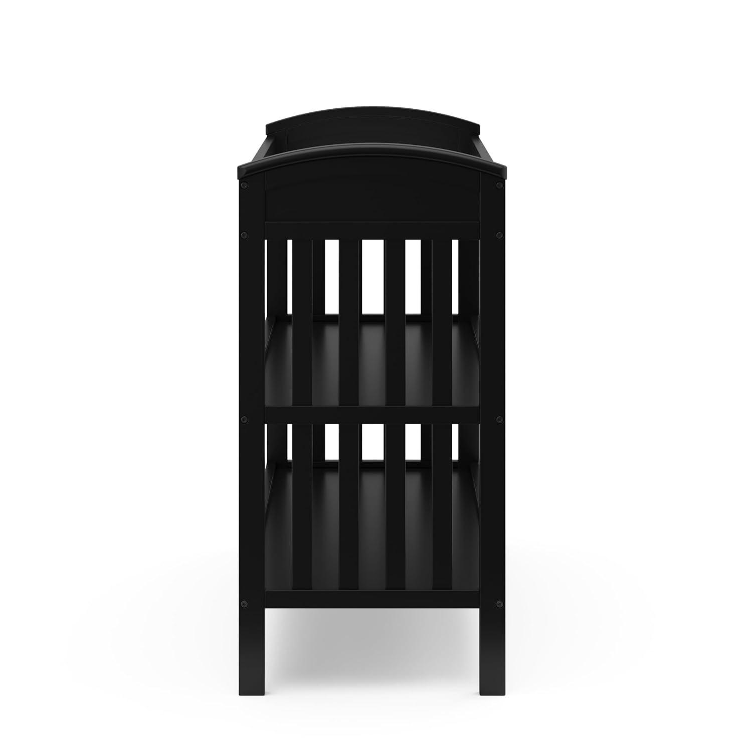 imageGraco Benton Changing Table with Bonus WaterResistant Changing Pad White GREENGUARD Gold Certified Includes Diaper Change Pad with Safety Strap 2 Open Storage Shelves for OrganizingBlack