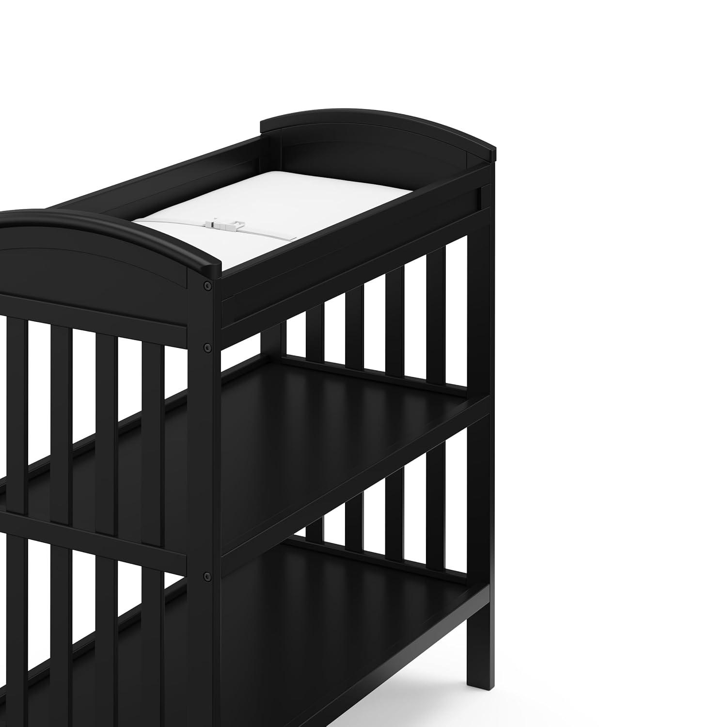 imageGraco Benton Changing Table with Bonus WaterResistant Changing Pad White GREENGUARD Gold Certified Includes Diaper Change Pad with Safety Strap 2 Open Storage Shelves for OrganizingBlack