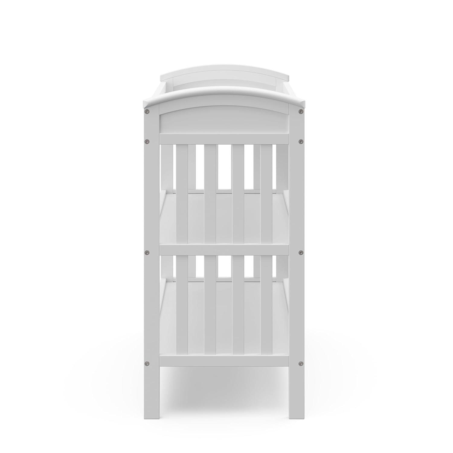 imageGraco Benton Changing Table with Bonus WaterResistant Changing Pad White GREENGUARD Gold Certified Includes Diaper Change Pad with Safety Strap 2 Open Storage Shelves for OrganizingWhite