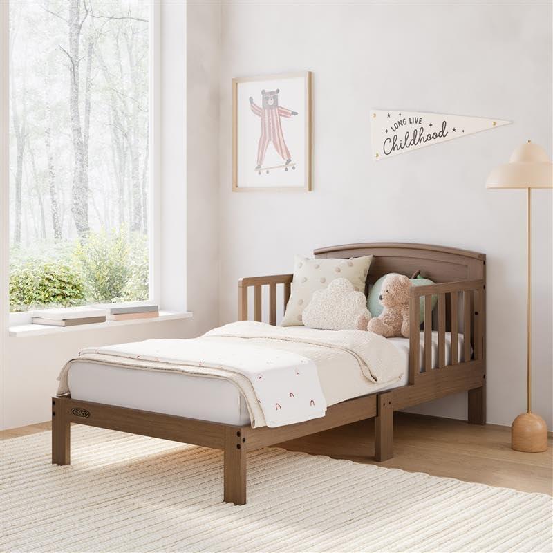 imageGraco Benton Toddler Bed White GREENGUARD Gold Certified Baby Safety Alliance Verified with Safety Toddler Guardrails Fits Standard Crib Mattress Easy Assembly Kids Transition BedHazelnut