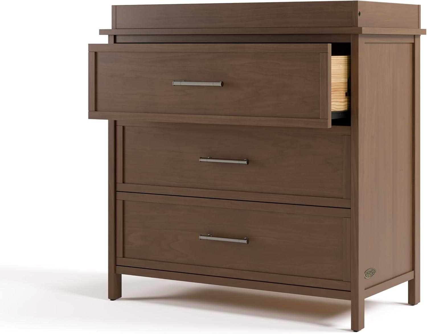 imageGraco Classic 3 Drawer Changing Table Dresser Blush GREENGUARD Gold Certified Baby Dresser with Changing Table Top Includes Interlocking Drawer SystemHazelnut