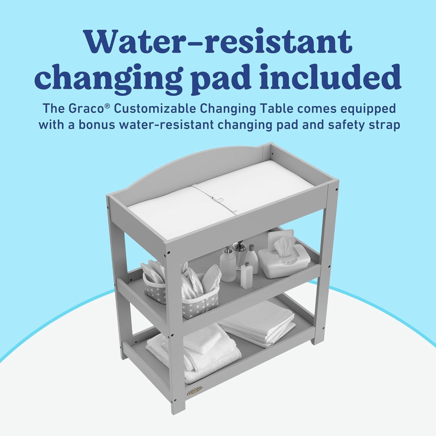 imageGraco Customizable Changing Table with WaterResistant Changing Pad White Customizable Modern Flat or Classic Arched Headboard Baby Diaper Changing Pad IncludedPebble Gray