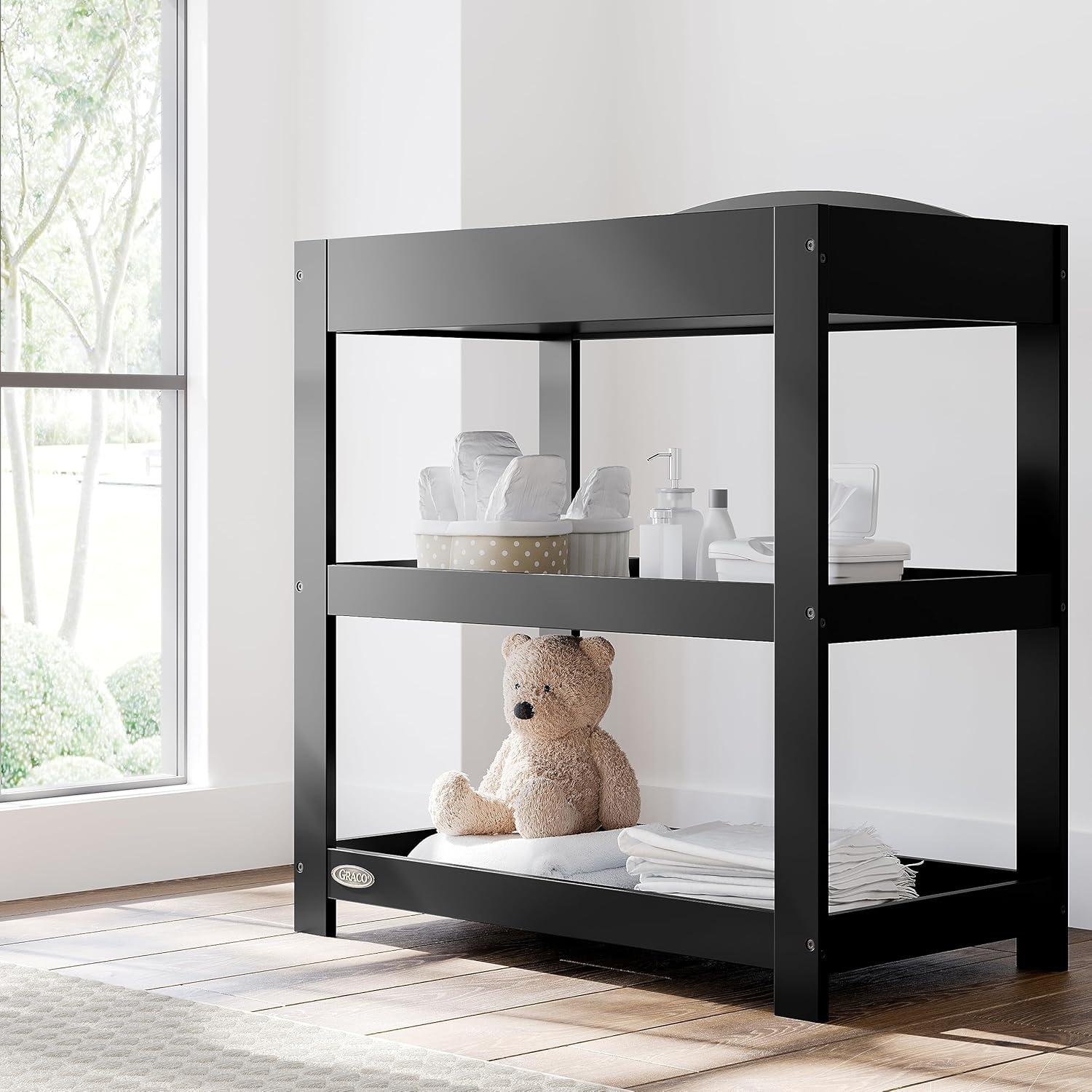 imageGraco Customizable Changing Table with WaterResistant Changing Pad White Customizable Modern Flat or Classic Arched Headboard Baby Diaper Changing Pad IncludedBlack