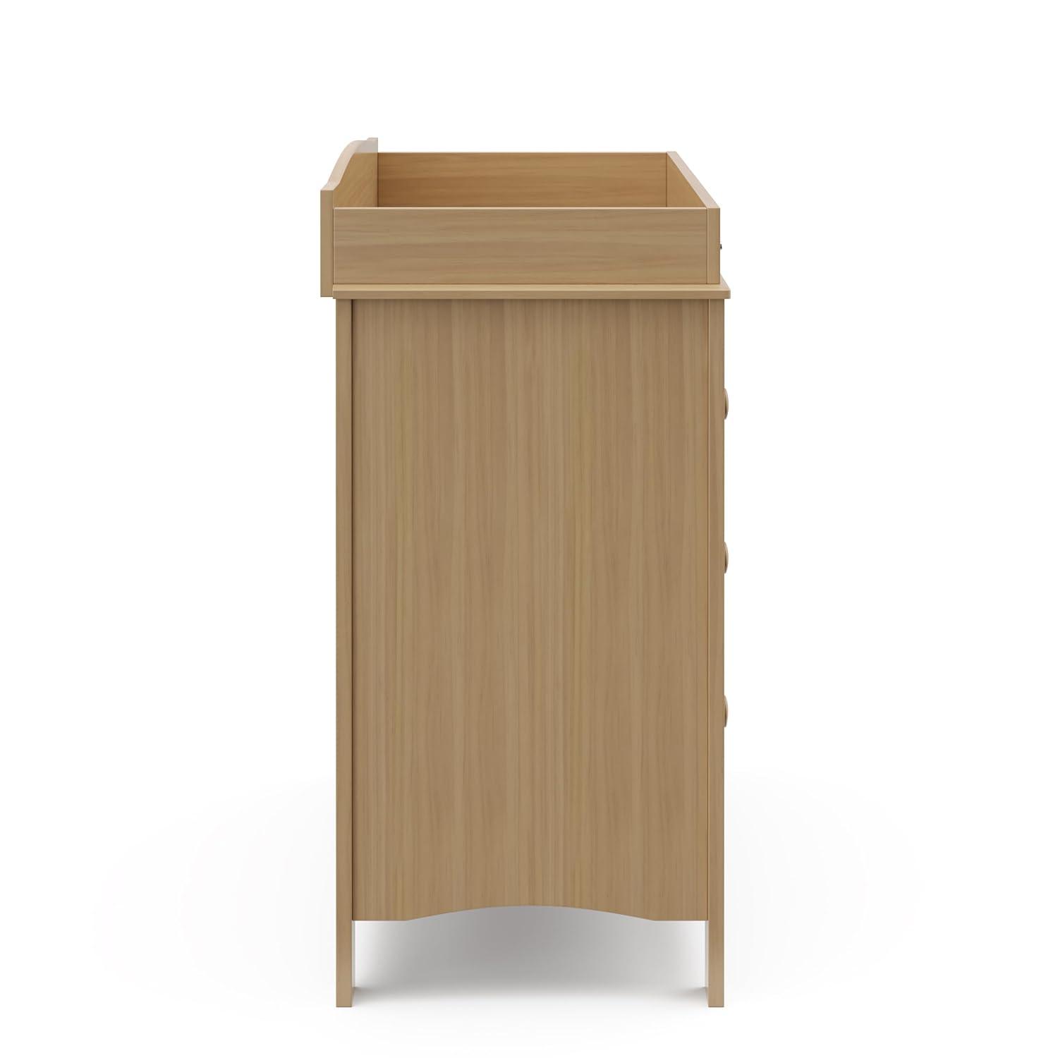 imageGraco Noah 3 Drawer Changing Table Dresser White GREENGUARD Gold Certified Baby Dresser with Changing Table Top Includes Interlocking Drawer SystemDriftwood