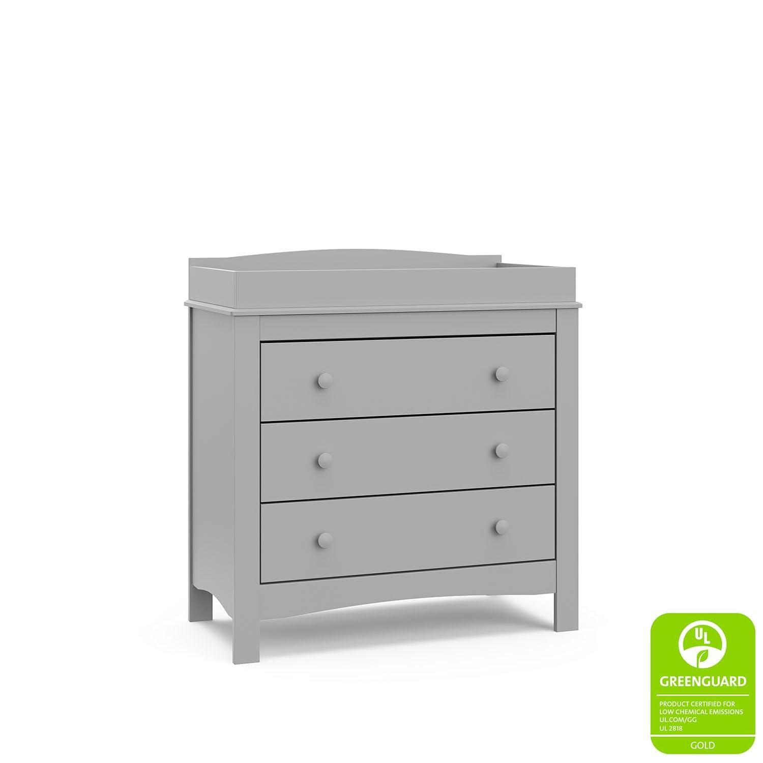 imageGraco Noah 3 Drawer Changing Table Dresser White GREENGUARD Gold Certified Baby Dresser with Changing Table Top Includes Interlocking Drawer SystemPebble Gray