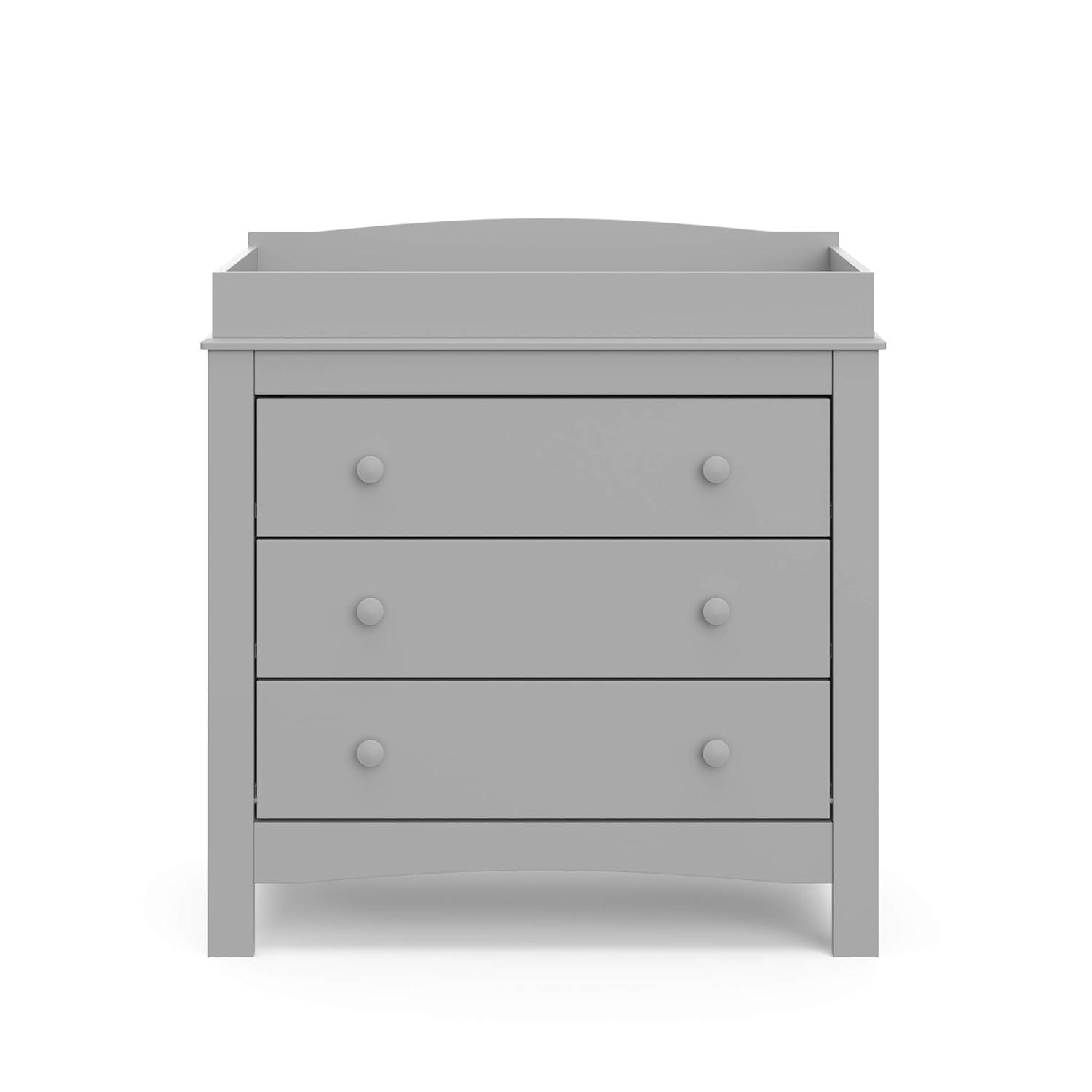 imageGraco Noah 3 Drawer Changing Table Dresser White GREENGUARD Gold Certified Baby Dresser with Changing Table Top Includes Interlocking Drawer SystemPebble Gray