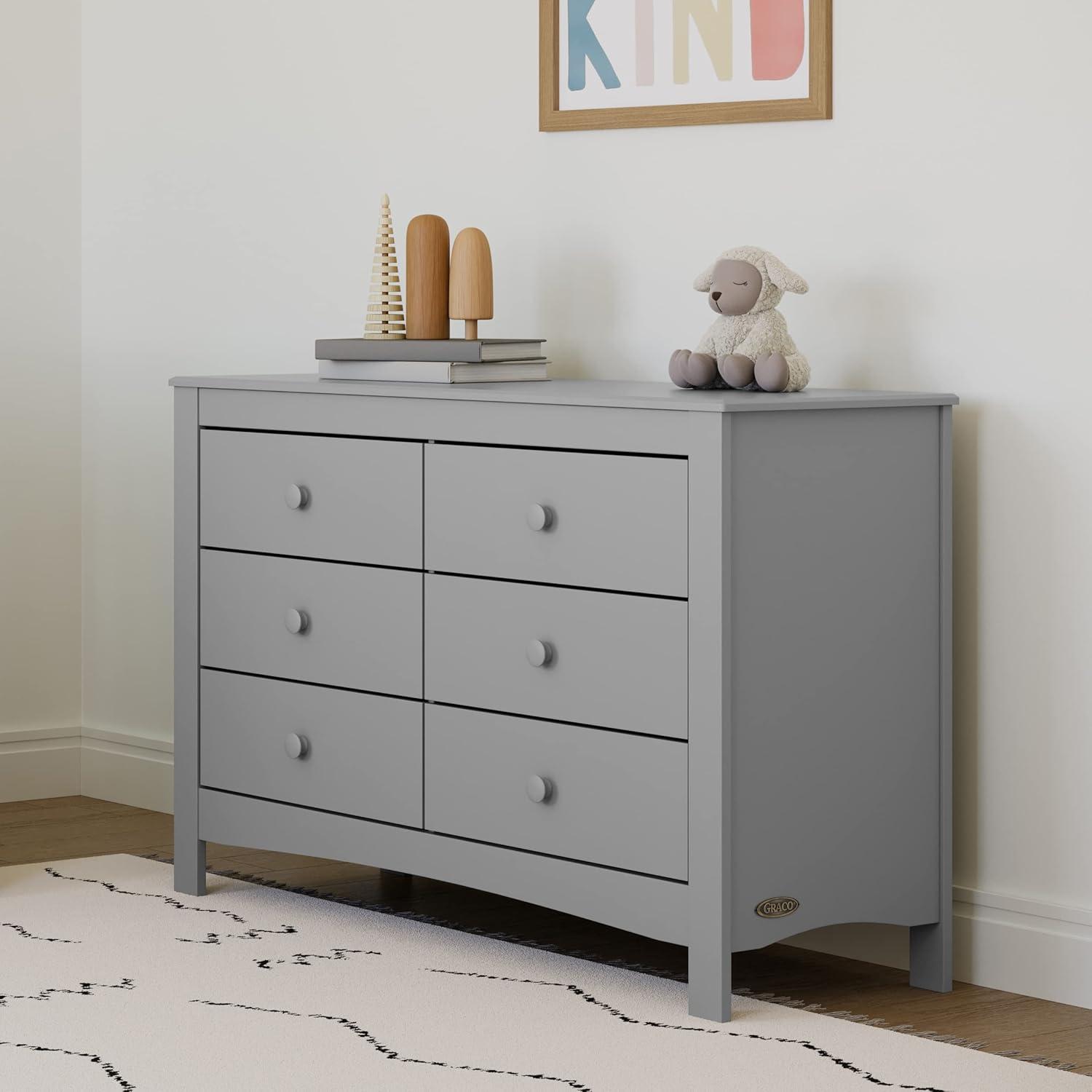 imageGraco Noah 3 Drawer Changing Table Dresser White GREENGUARD Gold Certified Baby Dresser with Changing Table Top Includes Interlocking Drawer SystemPebble Gray