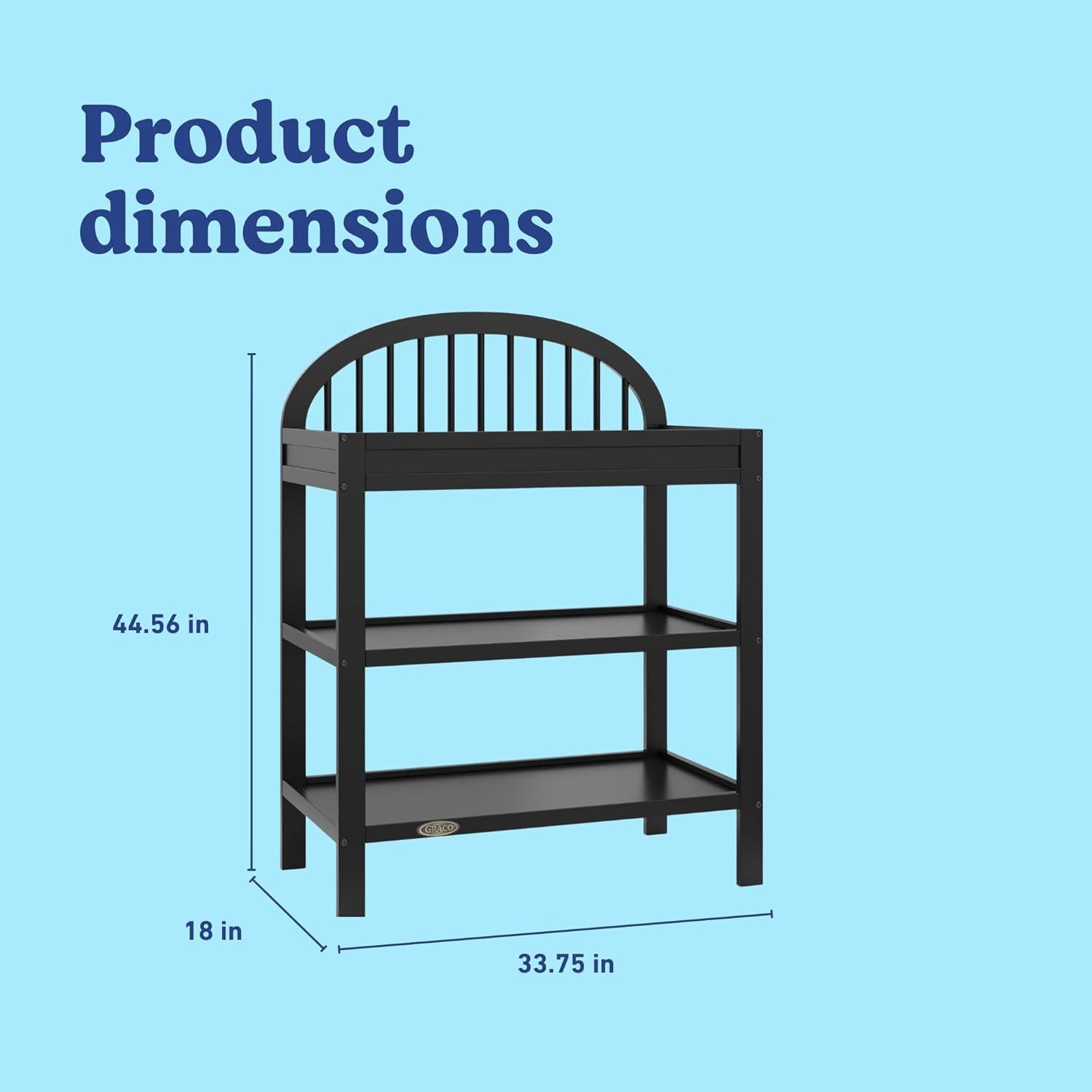 imageGraco Olivia Changing Table with WaterResistant Changing Pad Driftwood GREENGUARD Gold Certified Includes Bonus WaterResistant Changing Pad with Safety Strap 2 Open Shelves Stylish DesignBlack