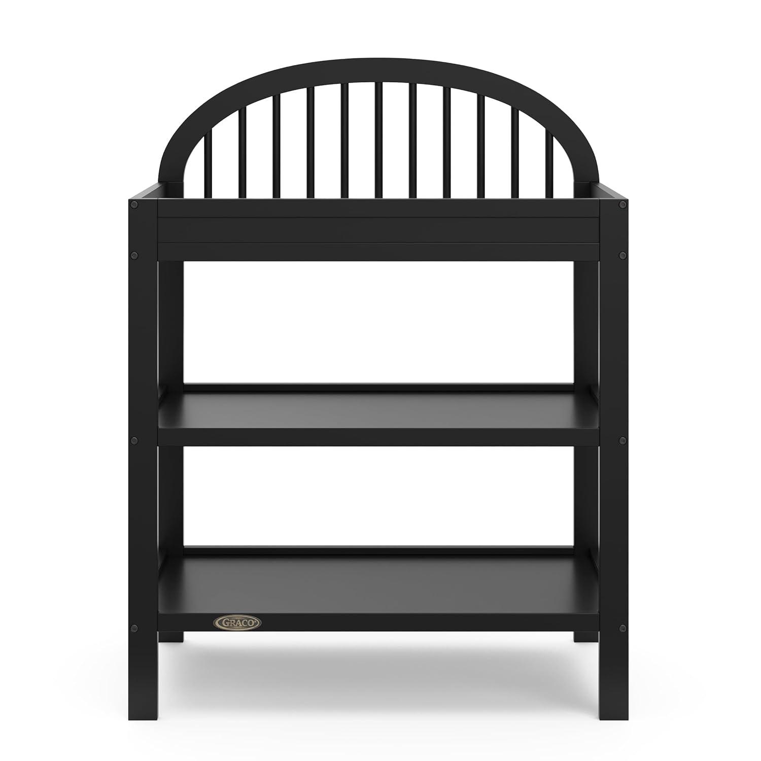 imageGraco Olivia Changing Table with WaterResistant Changing Pad Driftwood GREENGUARD Gold Certified Includes Bonus WaterResistant Changing Pad with Safety Strap 2 Open Shelves Stylish DesignBlack