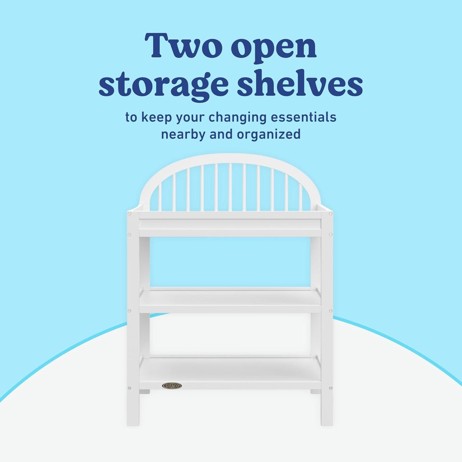 imageGraco Olivia Changing Table with WaterResistant Changing Pad Driftwood GREENGUARD Gold Certified Includes Bonus WaterResistant Changing Pad with Safety Strap 2 Open Shelves Stylish DesignWhite