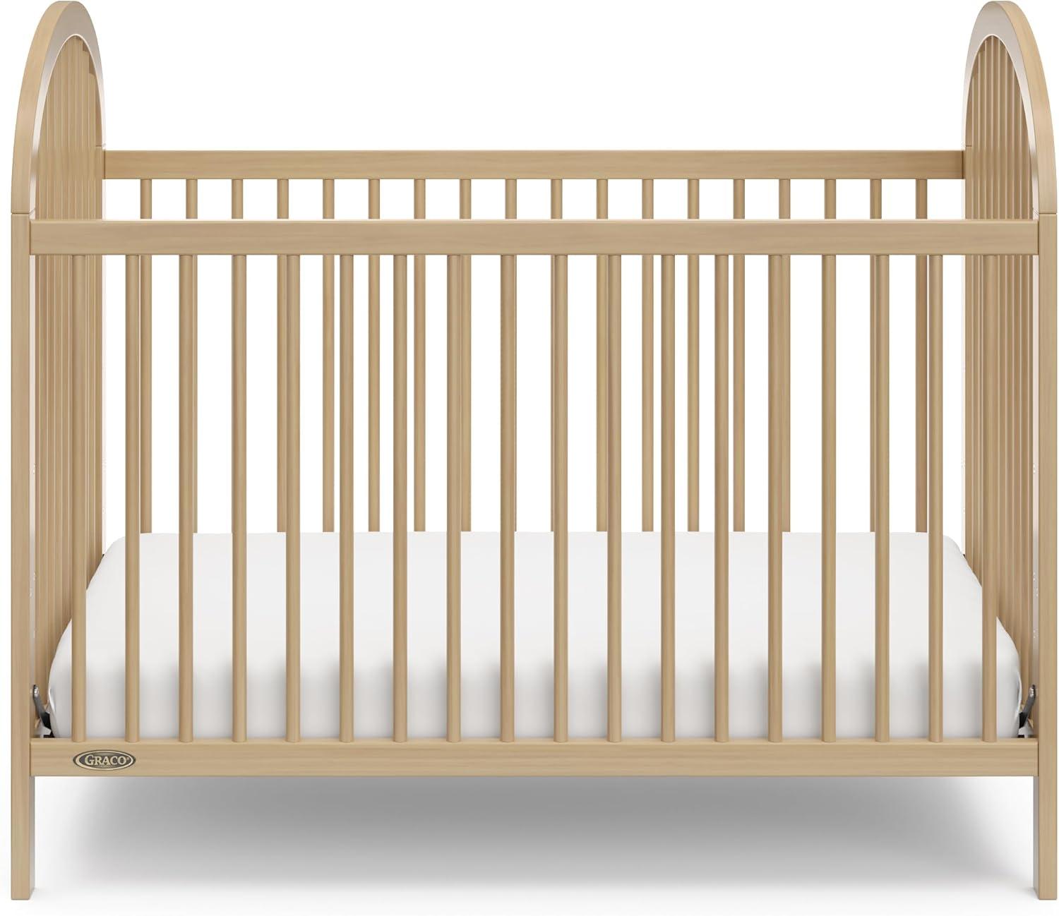 imageGraco Olivia Convertible Crib White GREENGUARD Gold Certified 100 Solid Wood Fits Standard Crib Mattress Converts to Toddler Bed and Daybed 4 Adjustable Mattress HeightsDriftwood