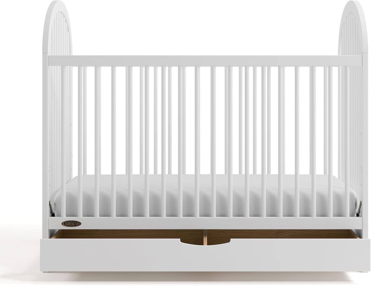imageGraco Olivia Convertible Crib White GREENGUARD Gold Certified 100 Solid Wood Fits Standard Crib Mattress Converts to Toddler Bed and Daybed 4 Adjustable Mattress HeightsWhite