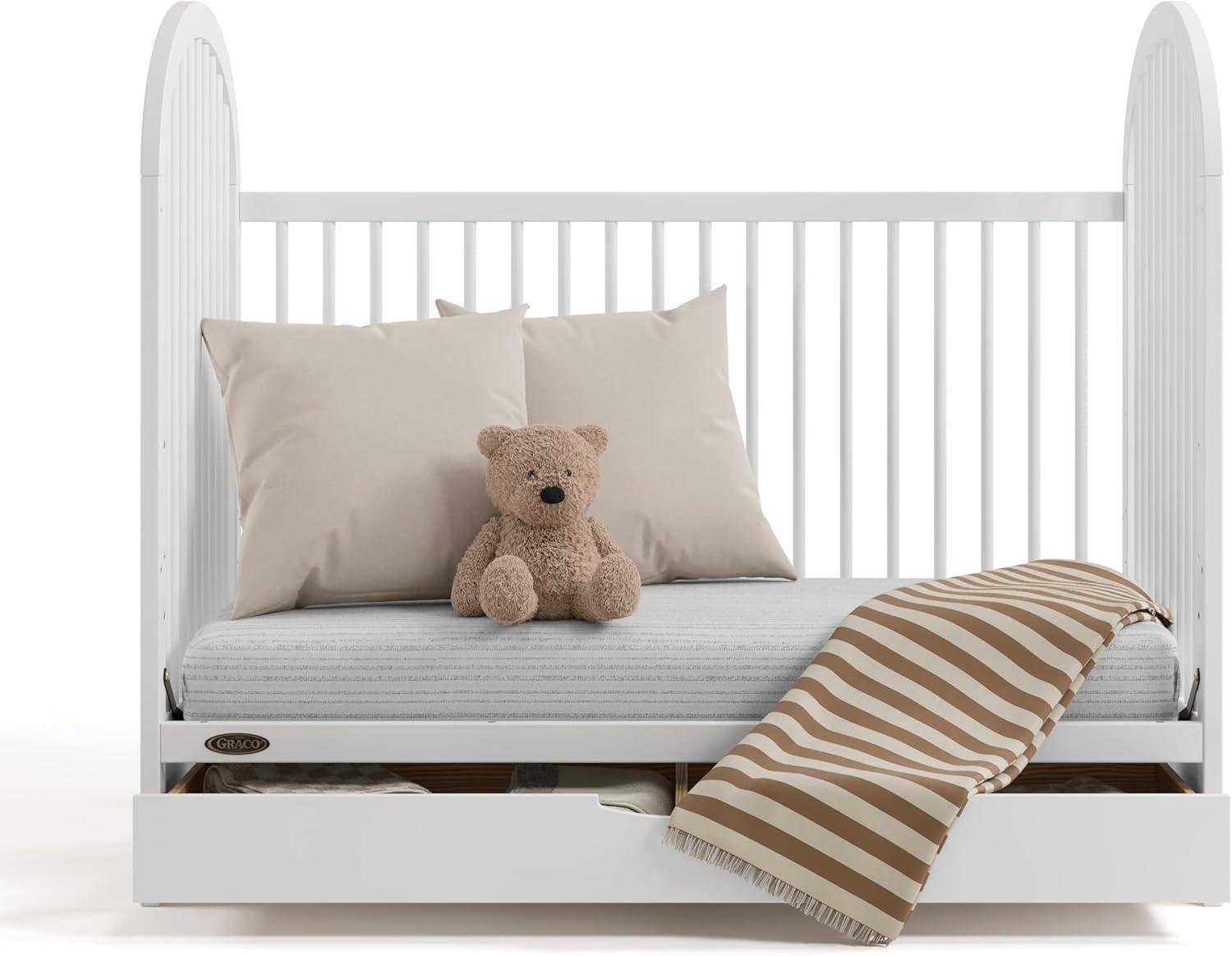 imageGraco Olivia Convertible Crib White GREENGUARD Gold Certified 100 Solid Wood Fits Standard Crib Mattress Converts to Toddler Bed and Daybed 4 Adjustable Mattress HeightsWhite