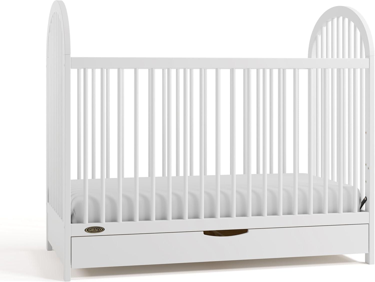 imageGraco Olivia Convertible Crib White GREENGUARD Gold Certified 100 Solid Wood Fits Standard Crib Mattress Converts to Toddler Bed and Daybed 4 Adjustable Mattress HeightsWhite