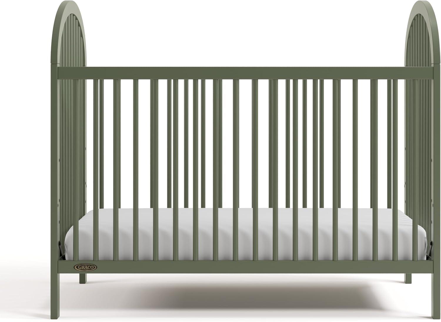 imageGraco Olivia Convertible Crib White GREENGUARD Gold Certified 100 Solid Wood Fits Standard Crib Mattress Converts to Toddler Bed and Daybed 4 Adjustable Mattress HeightsOlive