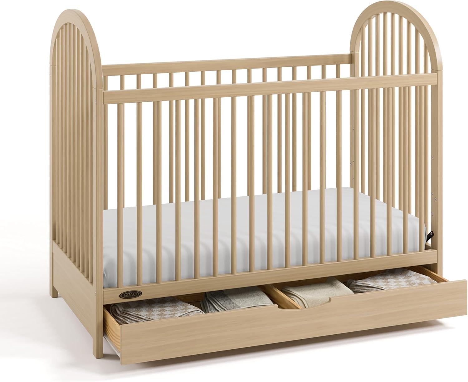 imageGraco Olivia Convertible Crib White GREENGUARD Gold Certified 100 Solid Wood Fits Standard Crib Mattress Converts to Toddler Bed and Daybed 4 Adjustable Mattress HeightsDriftwood