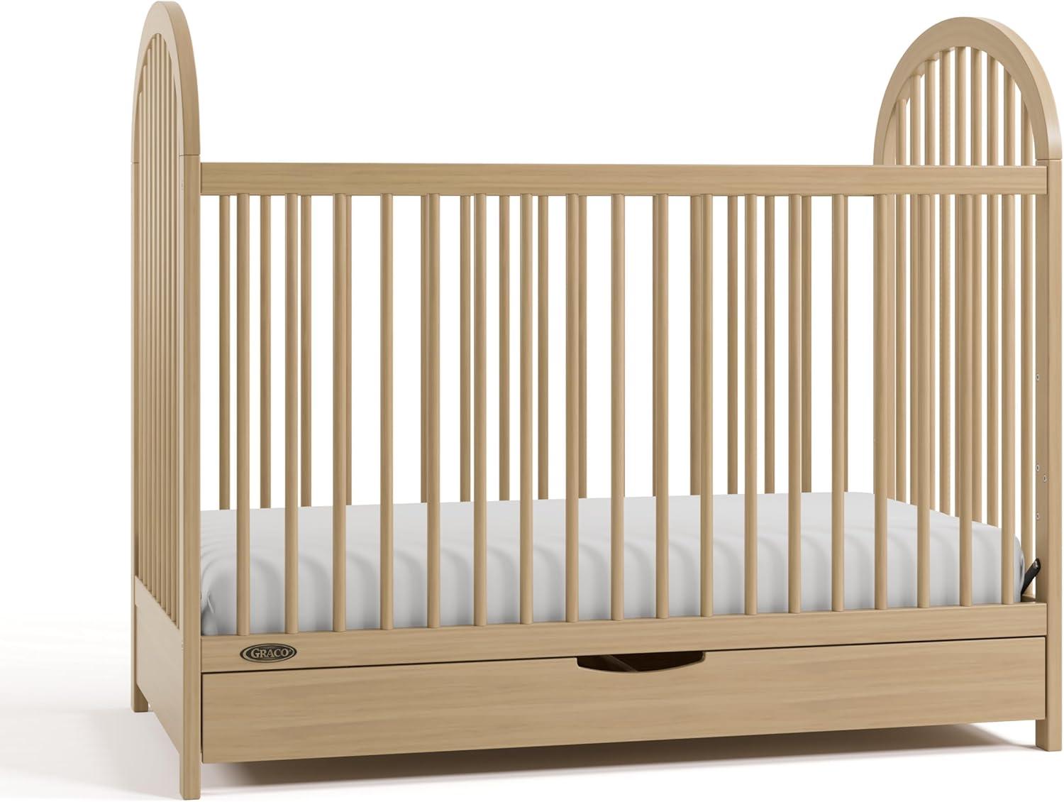 imageGraco Olivia Convertible Crib White GREENGUARD Gold Certified 100 Solid Wood Fits Standard Crib Mattress Converts to Toddler Bed and Daybed 4 Adjustable Mattress HeightsDriftwood