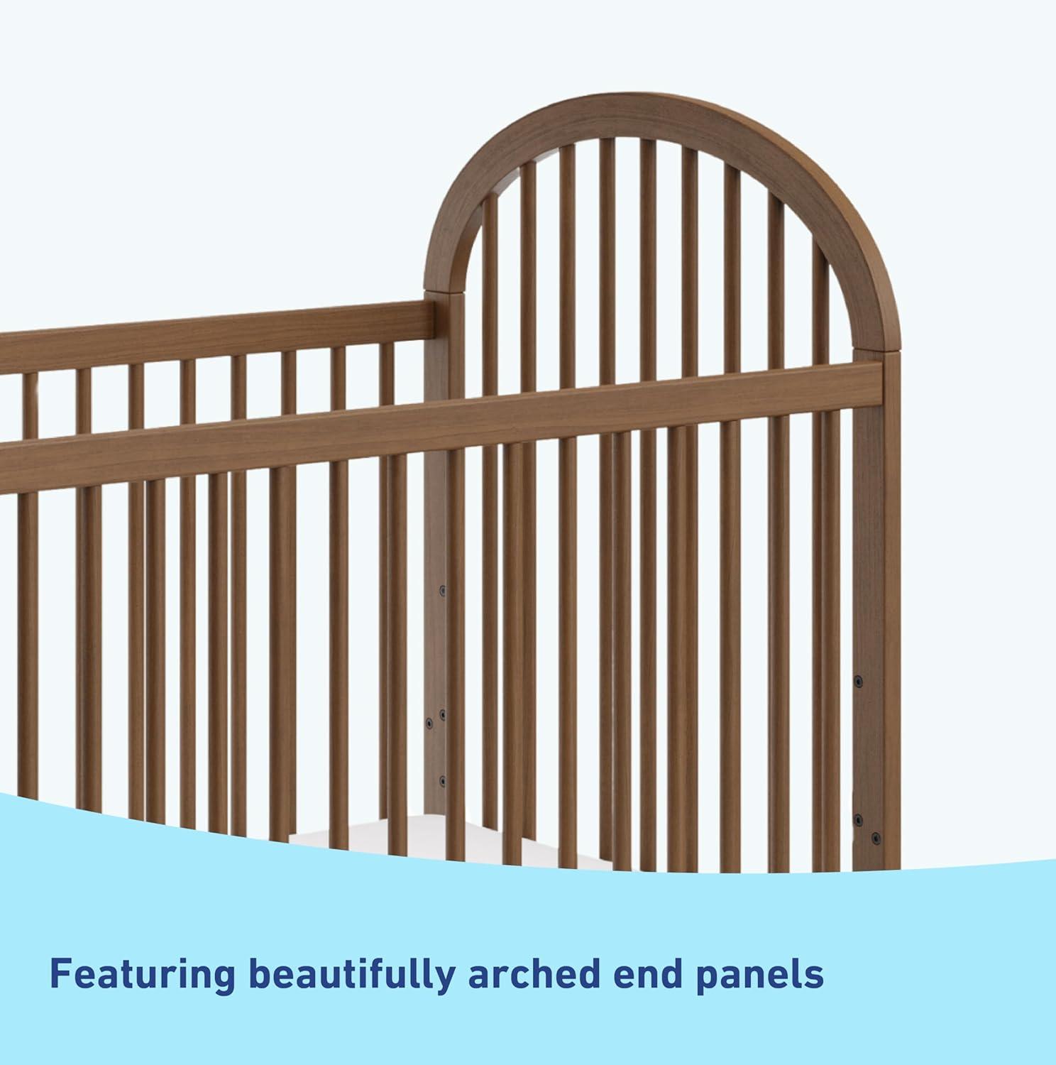 imageGraco Olivia Convertible Crib White GREENGUARD Gold Certified 100 Solid Wood Fits Standard Crib Mattress Converts to Toddler Bed and Daybed 4 Adjustable Mattress HeightsHazelnut