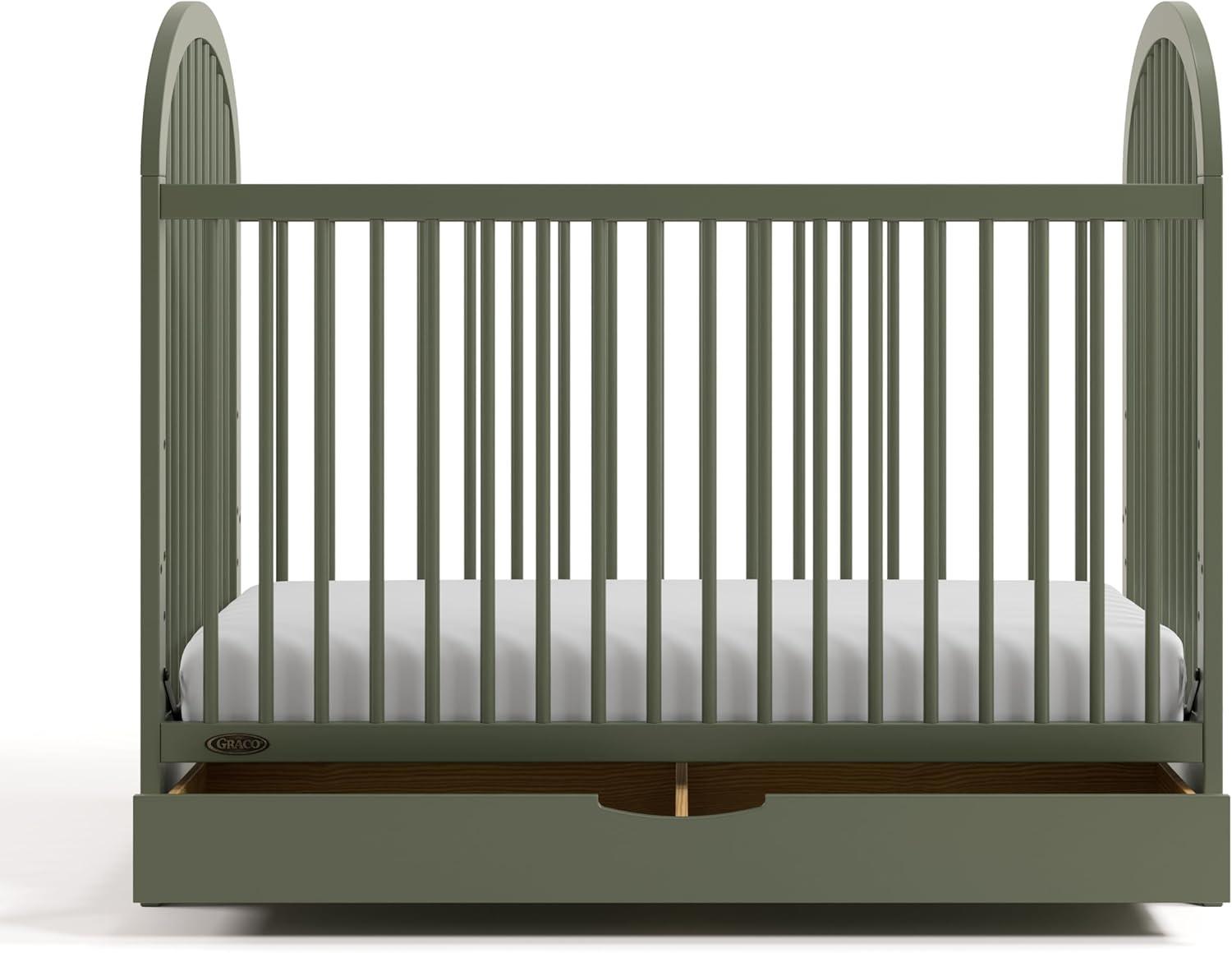 imageGraco Olivia Convertible Crib White GREENGUARD Gold Certified 100 Solid Wood Fits Standard Crib Mattress Converts to Toddler Bed and Daybed 4 Adjustable Mattress HeightsOlive