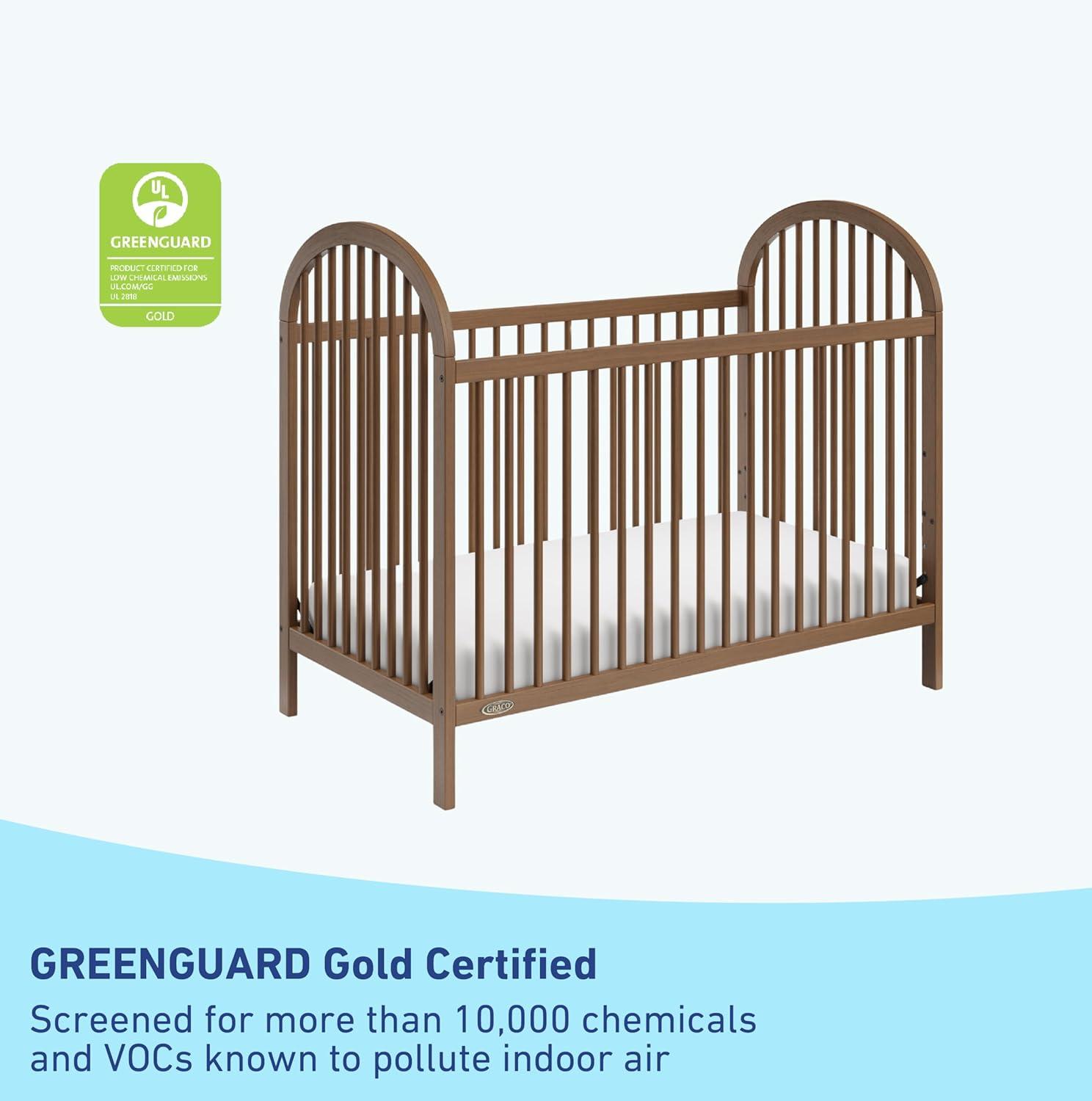 imageGraco Olivia Convertible Crib White GREENGUARD Gold Certified 100 Solid Wood Fits Standard Crib Mattress Converts to Toddler Bed and Daybed 4 Adjustable Mattress HeightsHazelnut