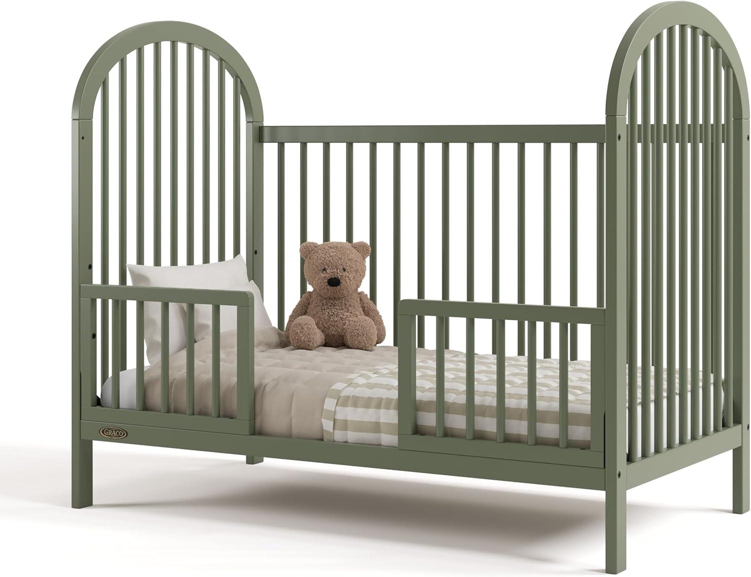 imageGraco Olivia Convertible Crib White GREENGUARD Gold Certified 100 Solid Wood Fits Standard Crib Mattress Converts to Toddler Bed and Daybed 4 Adjustable Mattress HeightsOlive