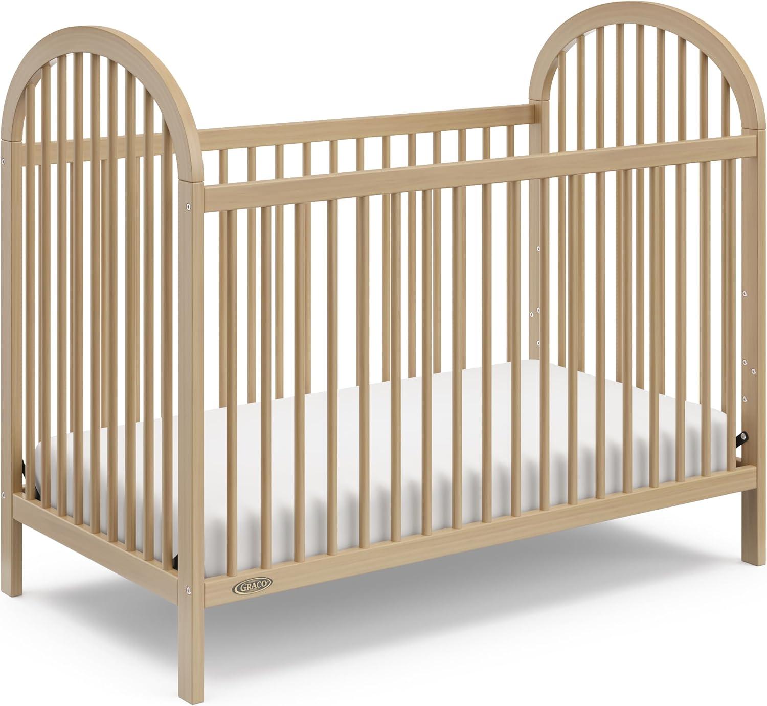 imageGraco Olivia Convertible Crib White GREENGUARD Gold Certified 100 Solid Wood Fits Standard Crib Mattress Converts to Toddler Bed and Daybed 4 Adjustable Mattress HeightsDriftwood