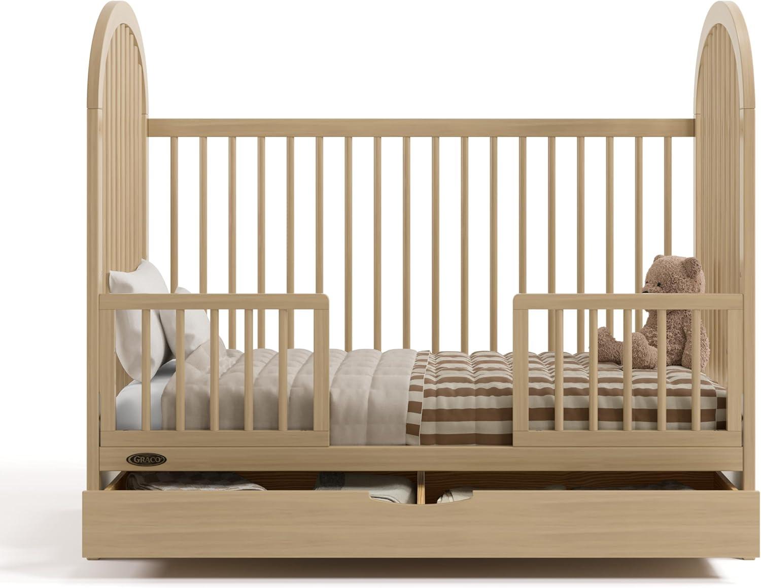 imageGraco Olivia Convertible Crib White GREENGUARD Gold Certified 100 Solid Wood Fits Standard Crib Mattress Converts to Toddler Bed and Daybed 4 Adjustable Mattress HeightsDriftwood