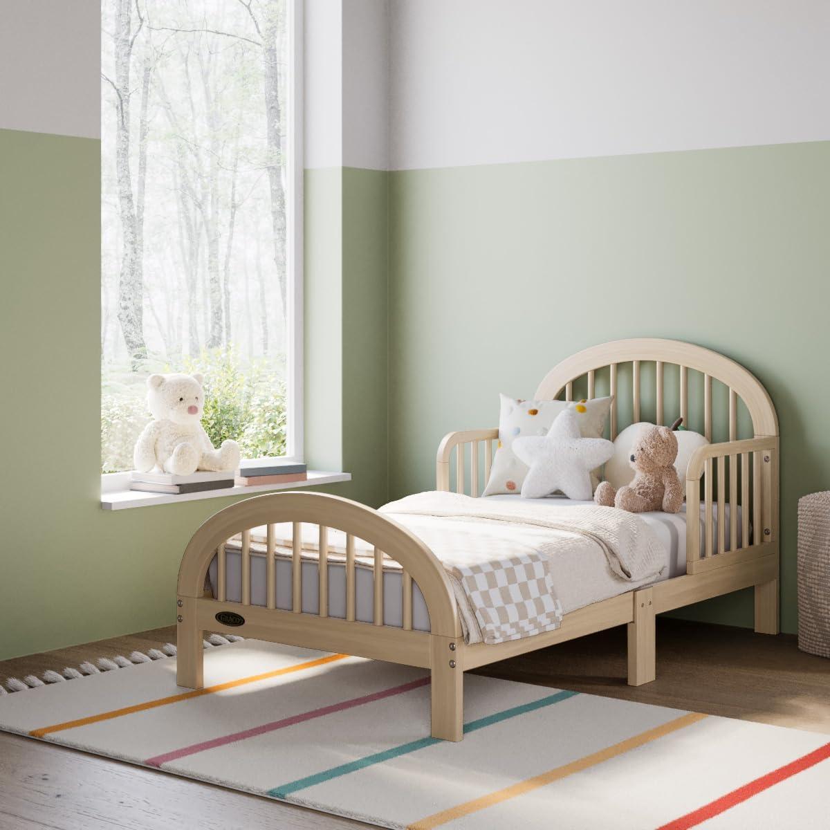 imageGraco Olivia Toddler Bed Driftwood GREENGUARD Gold Certified Includes Toddler Safety Guardrails Fits Standard Crib ampamp Toddler Mattress Stylish Arched DesignDriftwood