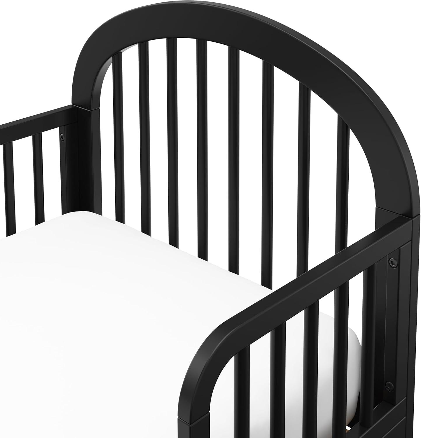 imageGraco Olivia Toddler Bed Driftwood GREENGUARD Gold Certified Includes Toddler Safety Guardrails Fits Standard Crib ampamp Toddler Mattress Stylish Arched DesignBlack