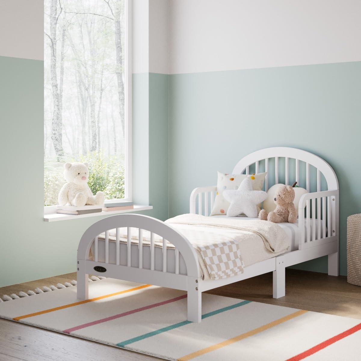 imageGraco Olivia Toddler Bed Driftwood GREENGUARD Gold Certified Includes Toddler Safety Guardrails Fits Standard Crib ampamp Toddler Mattress Stylish Arched DesignWhite