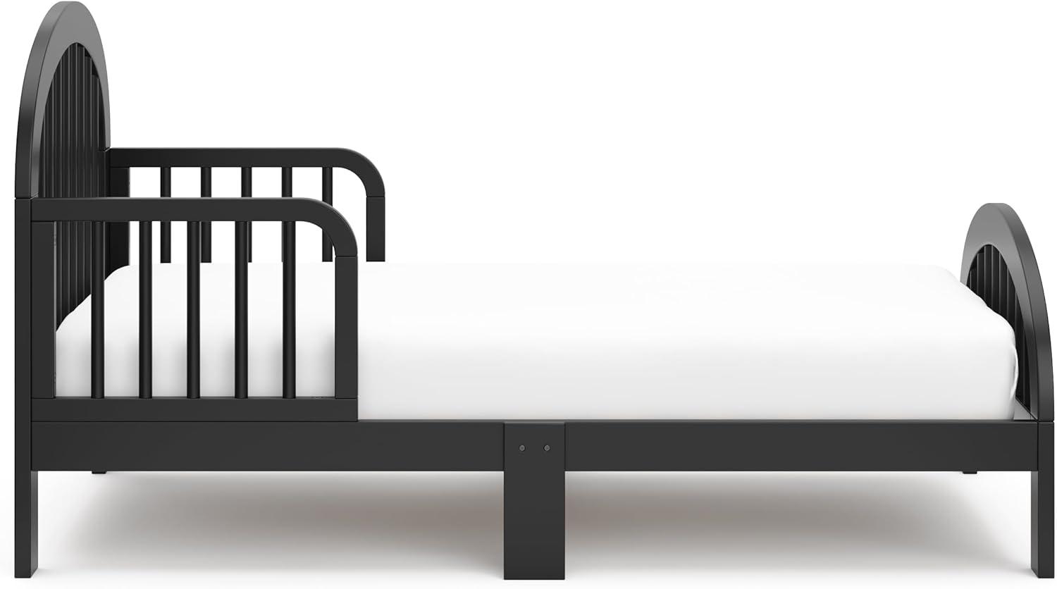 imageGraco Olivia Toddler Bed Driftwood GREENGUARD Gold Certified Includes Toddler Safety Guardrails Fits Standard Crib ampamp Toddler Mattress Stylish Arched DesignBlack