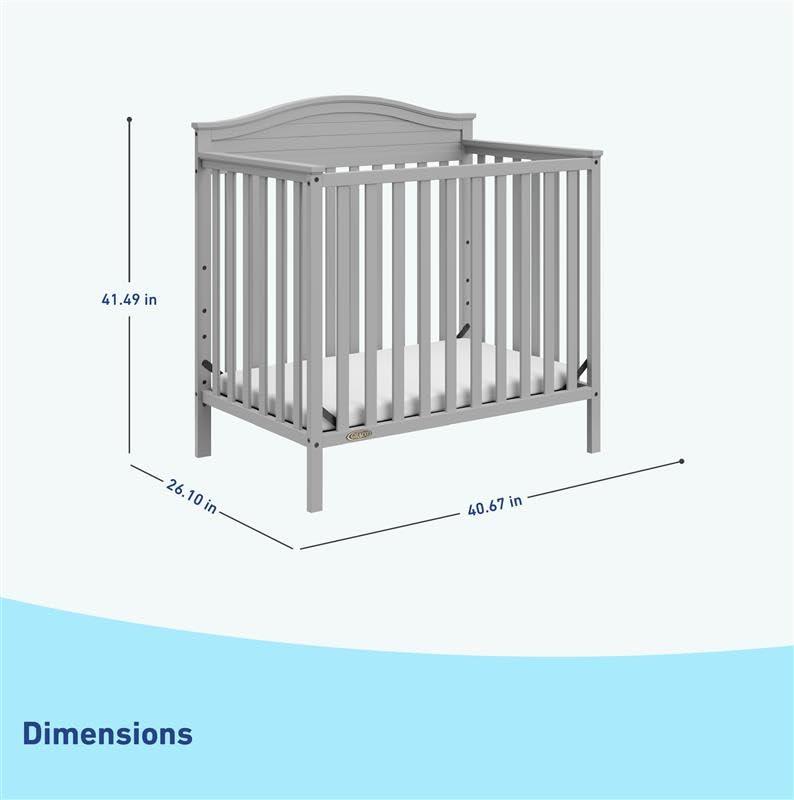 imageGraco Stella 4in1 Convertible Mini Crib with Bonus Mattress White Includes Bonus 275 Inch Thick Mattress with WaterResistant Cover Converts to Twin Bed Ideal Crib for Small SpacesPebble Gray