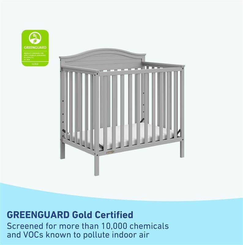 imageGraco Stella 4in1 Convertible Mini Crib with Bonus Mattress White Includes Bonus 275 Inch Thick Mattress with WaterResistant Cover Converts to Twin Bed Ideal Crib for Small SpacesPebble Gray