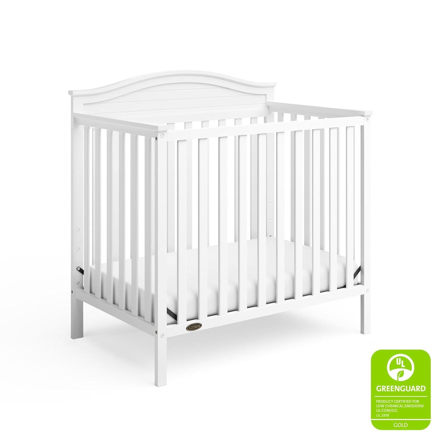 imageGraco Stella 4in1 Convertible Mini Crib with Bonus Mattress White Includes Bonus 275 Inch Thick Mattress with WaterResistant Cover Converts to Twin Bed Ideal Crib for Small SpacesWhite
