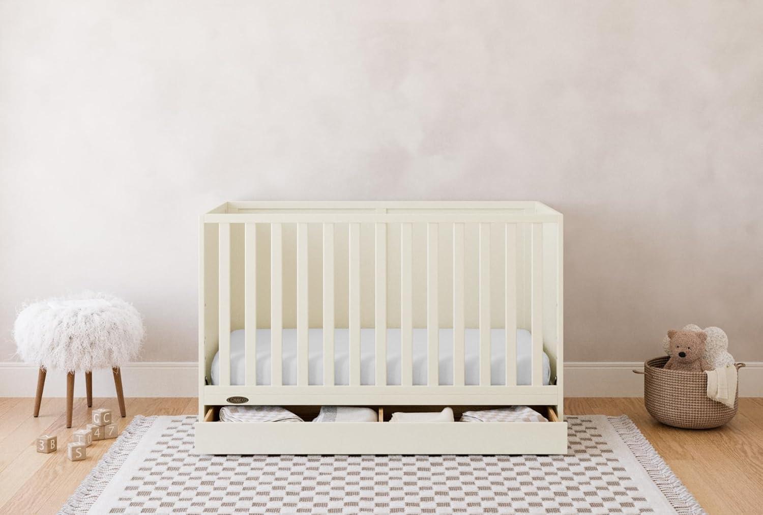 imageGraco Theo 3in1 Convertible Baby Crib White GREENGUARD Gold Certified Converts to Toddler Bed ampamp Daybed Fits Standard FullSize Baby Crib Mattress 4 Adjustable Mattress HeightsFrosted Oat