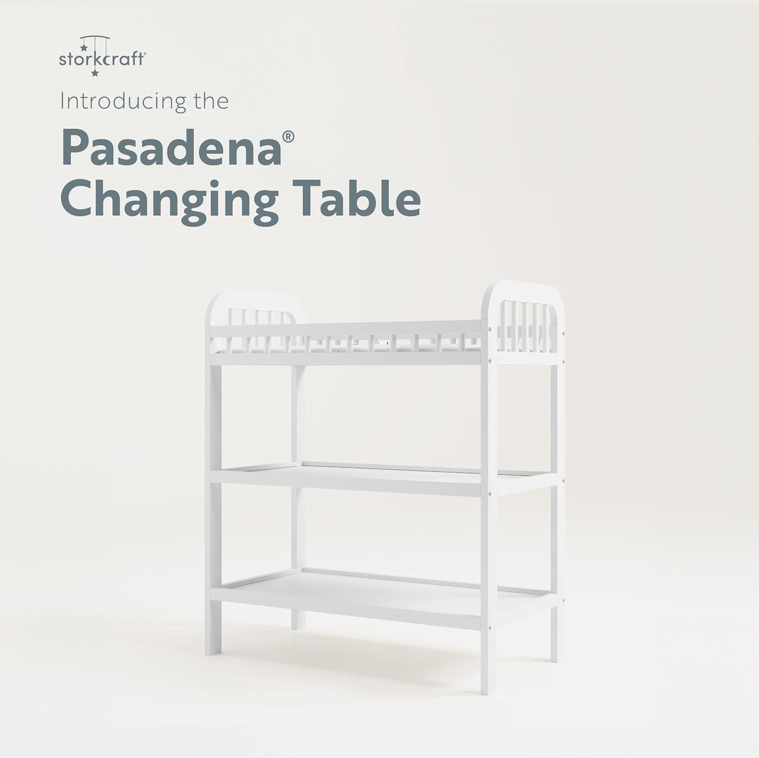 imageStorkcraft Pasadena Changing Table with WaterResistant Changing Pad Driftwood GREENGUARD Gold Certified Includes Bonus WaterResistant Changing Pad with Safety Strap 2 Open ShelvesWhite